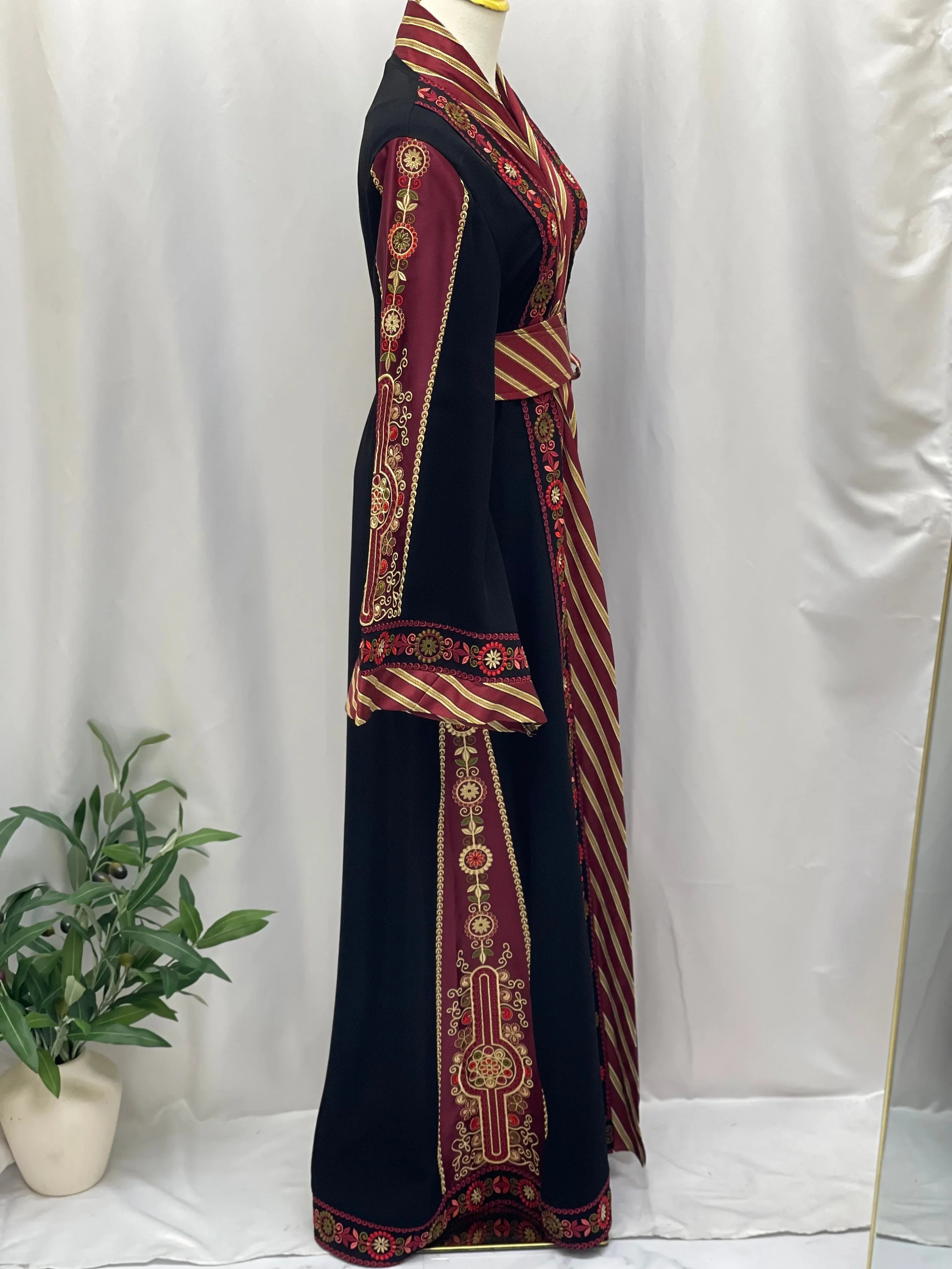 Palestinian Elegance embroidered Kashmir abaya in black with intricate red and gold embroidery details