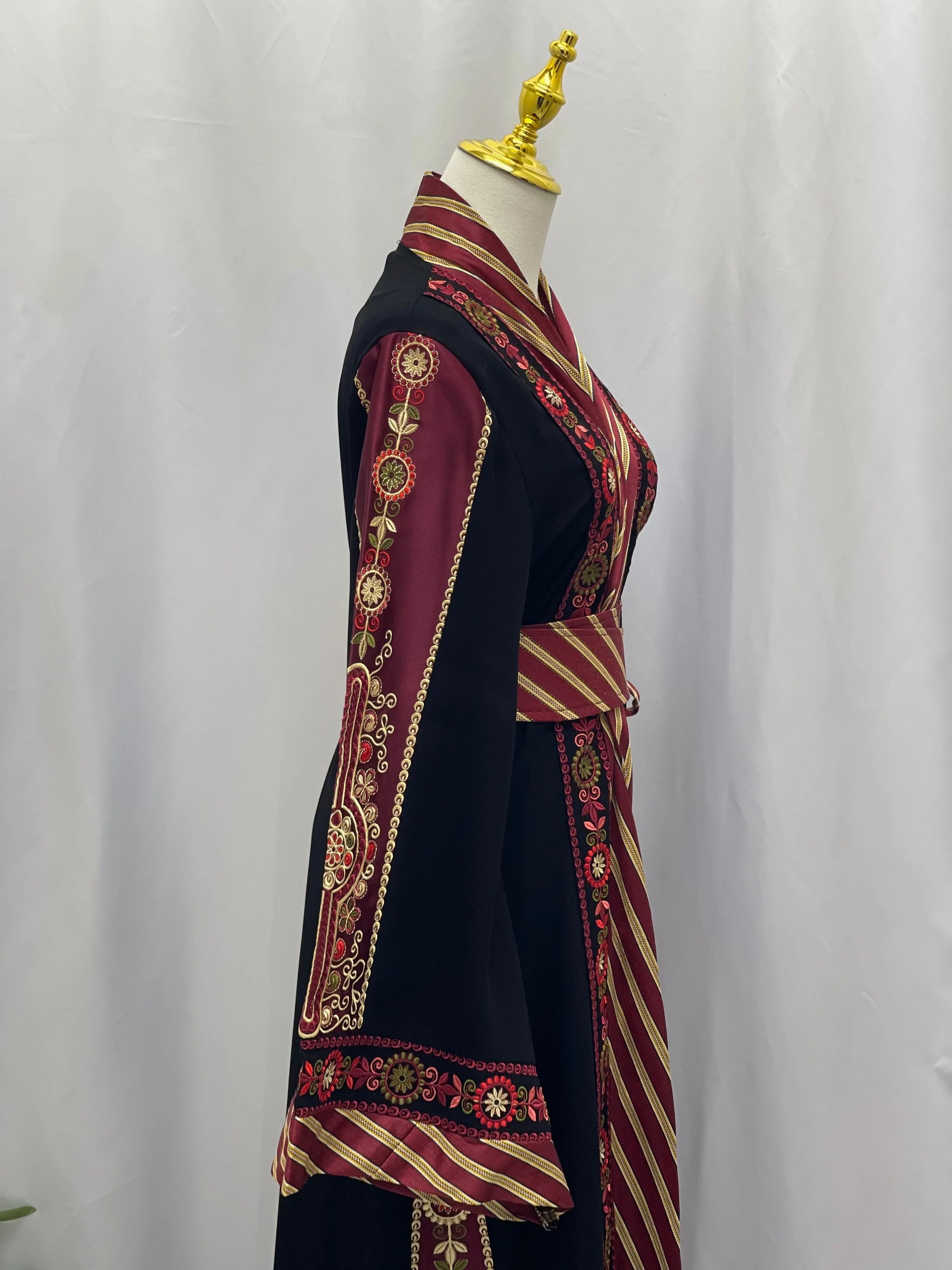 Black and maroon embroidered Kashmir abaya with intricate floral embroidery and striped accents on sleeves and waist
