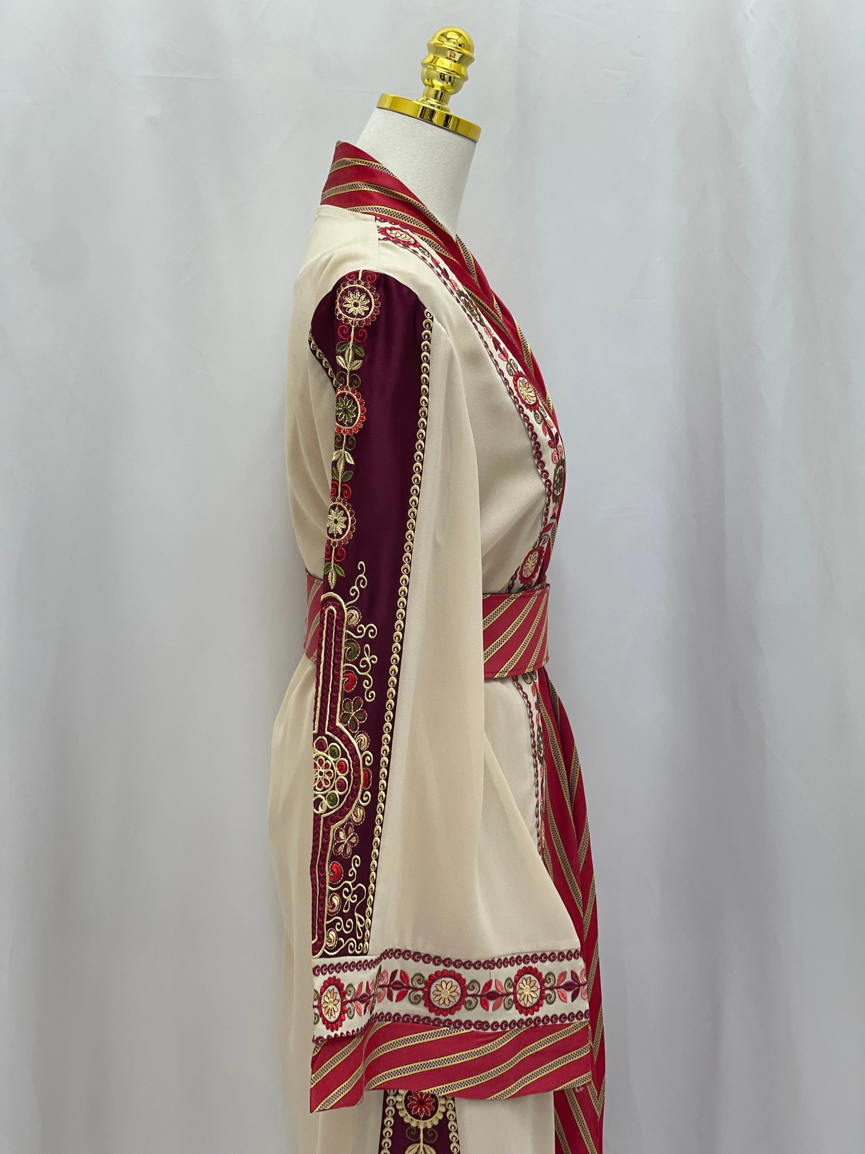 Palestinian Elegance embroidered Kashmir abaya with detailed red and gold embroidery on cream and maroon fabric