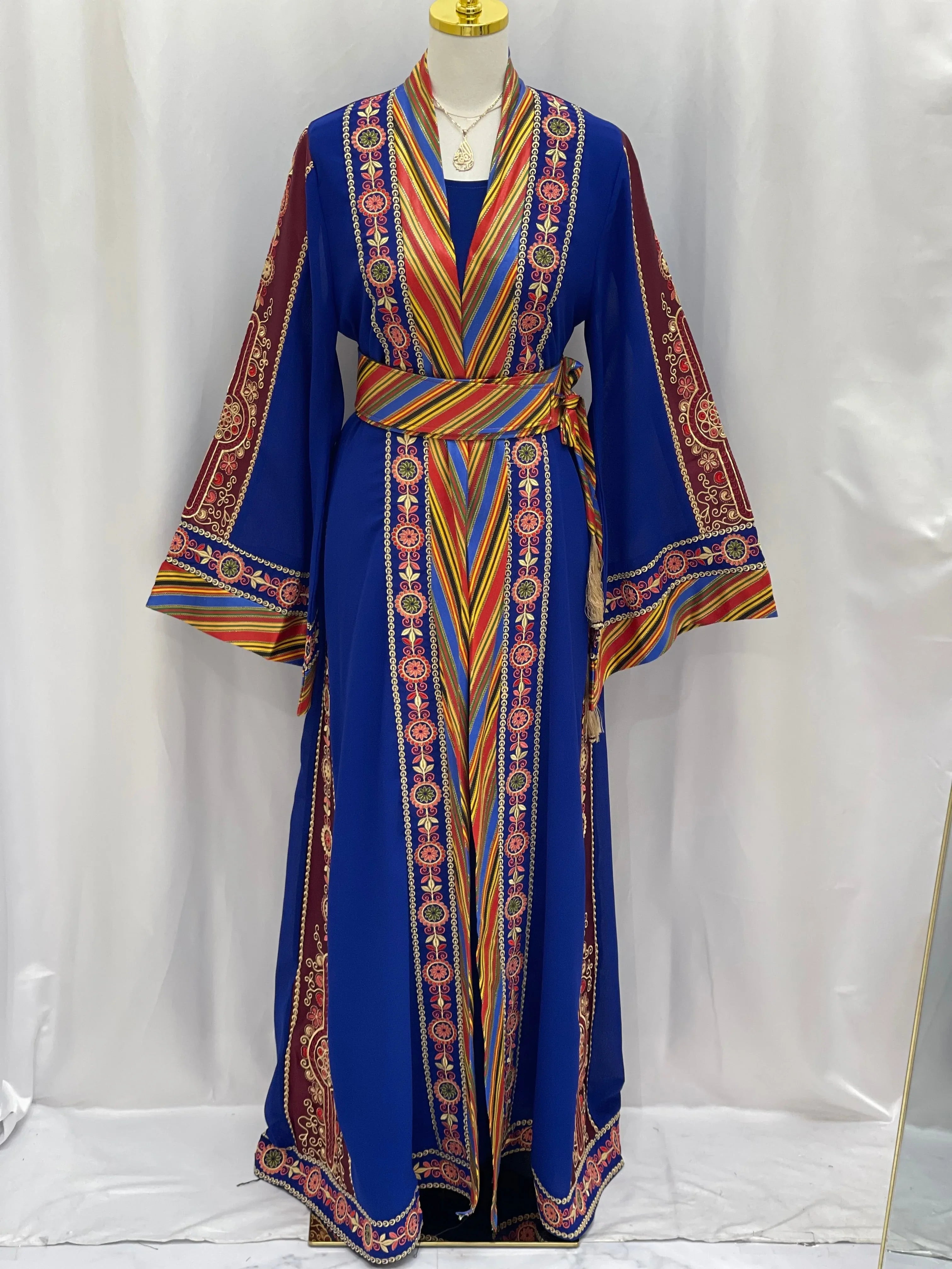 Embroidered Kashmir abaya in vibrant blue with intricate multicolor and red embroidery from Palestinian Elegance