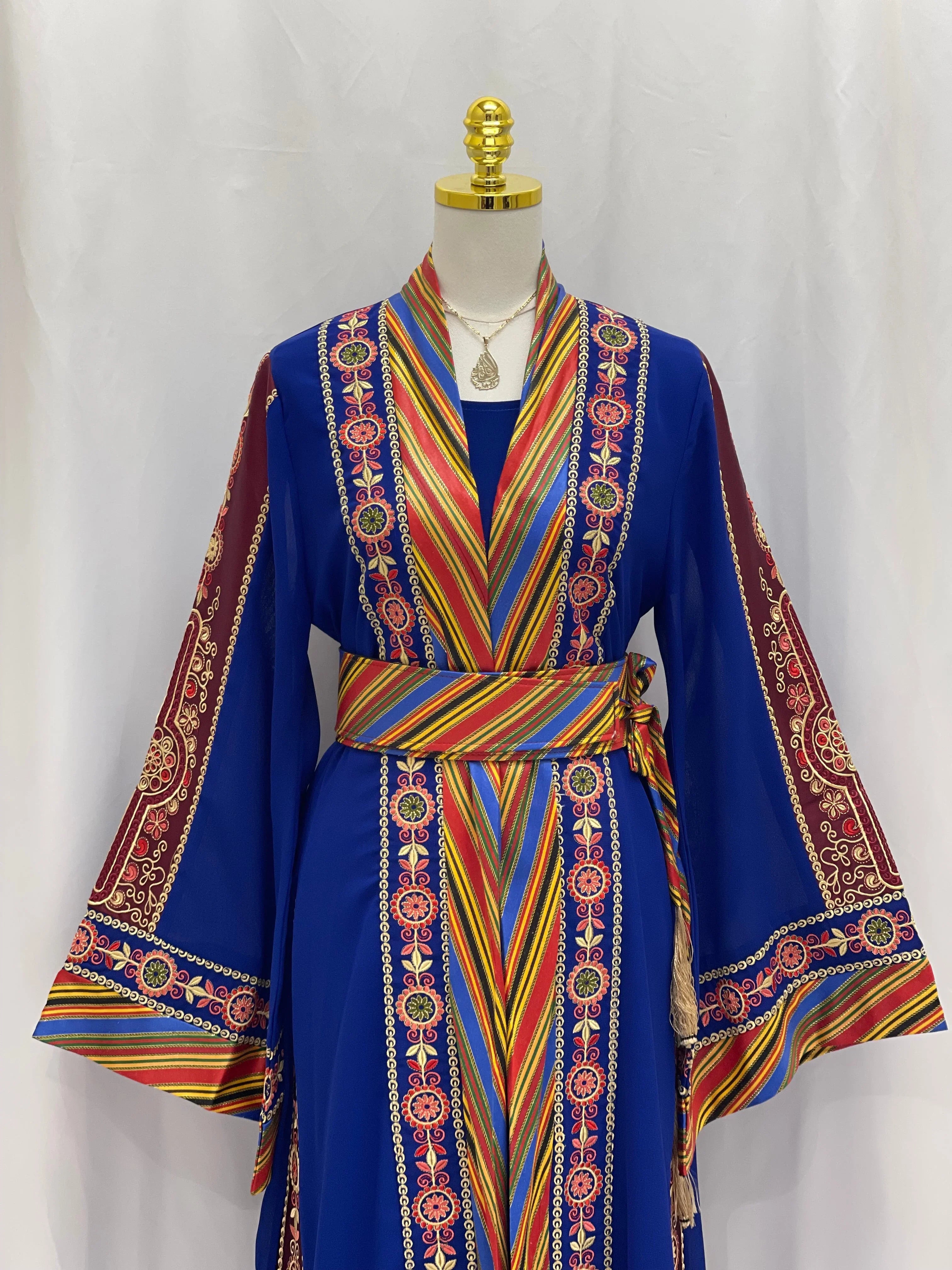 Palestinian Elegance embroidered Kashmir abaya in vibrant blue with colorful striped and floral embroidered patterns