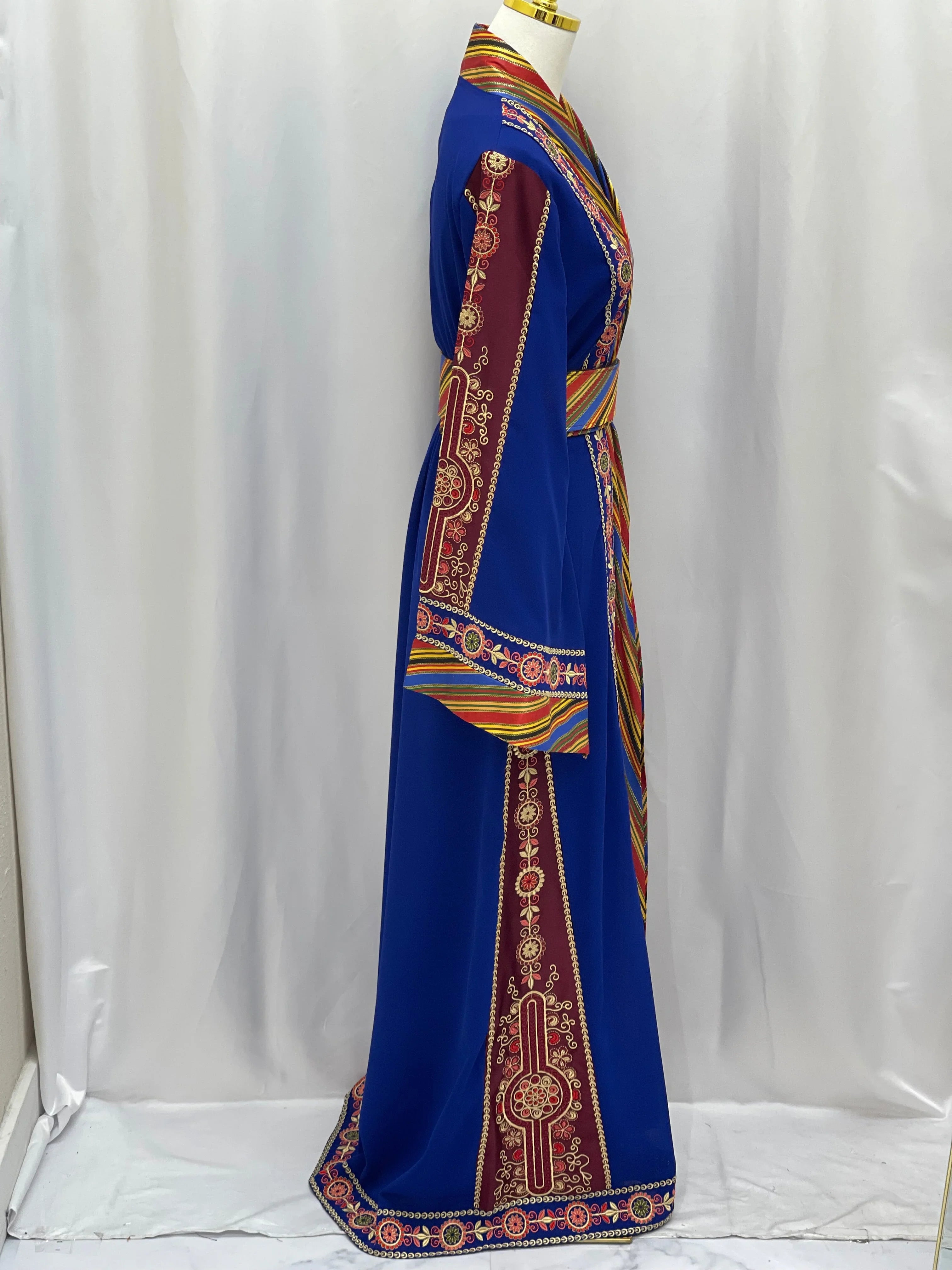 Palestinian Elegance embroidered Kashmir abaya in blue with intricate red and gold embroidery details