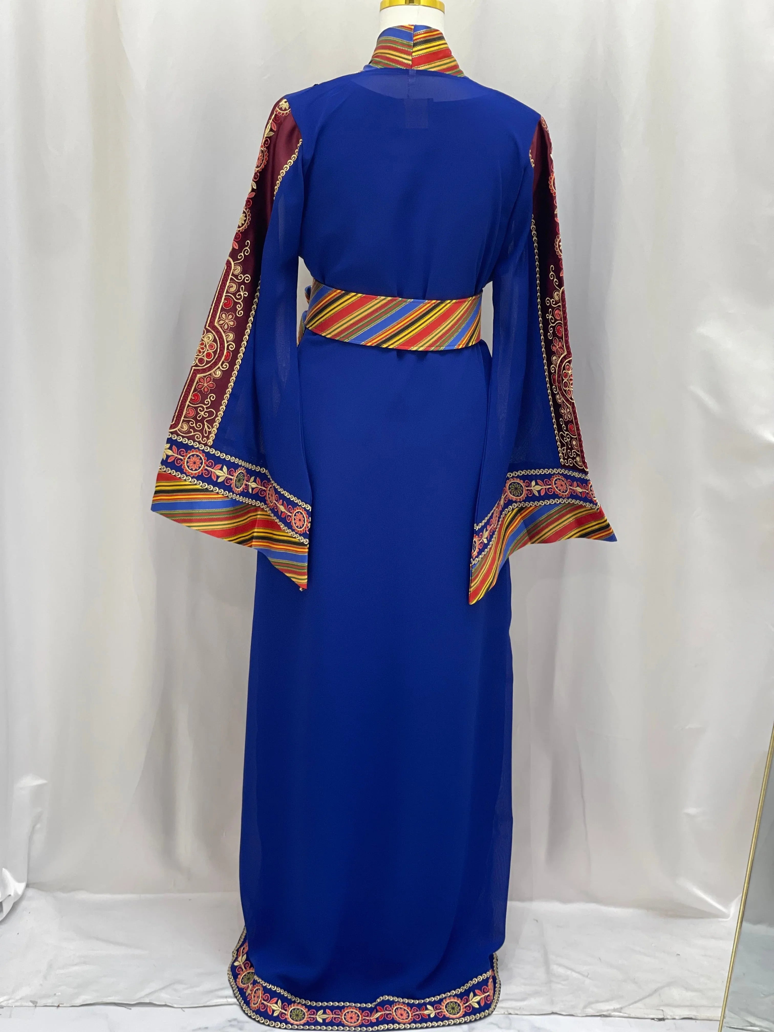 Palestinian Elegance embroidered Kashmir abaya in royal blue with colorful embroidered sleeves and waistband