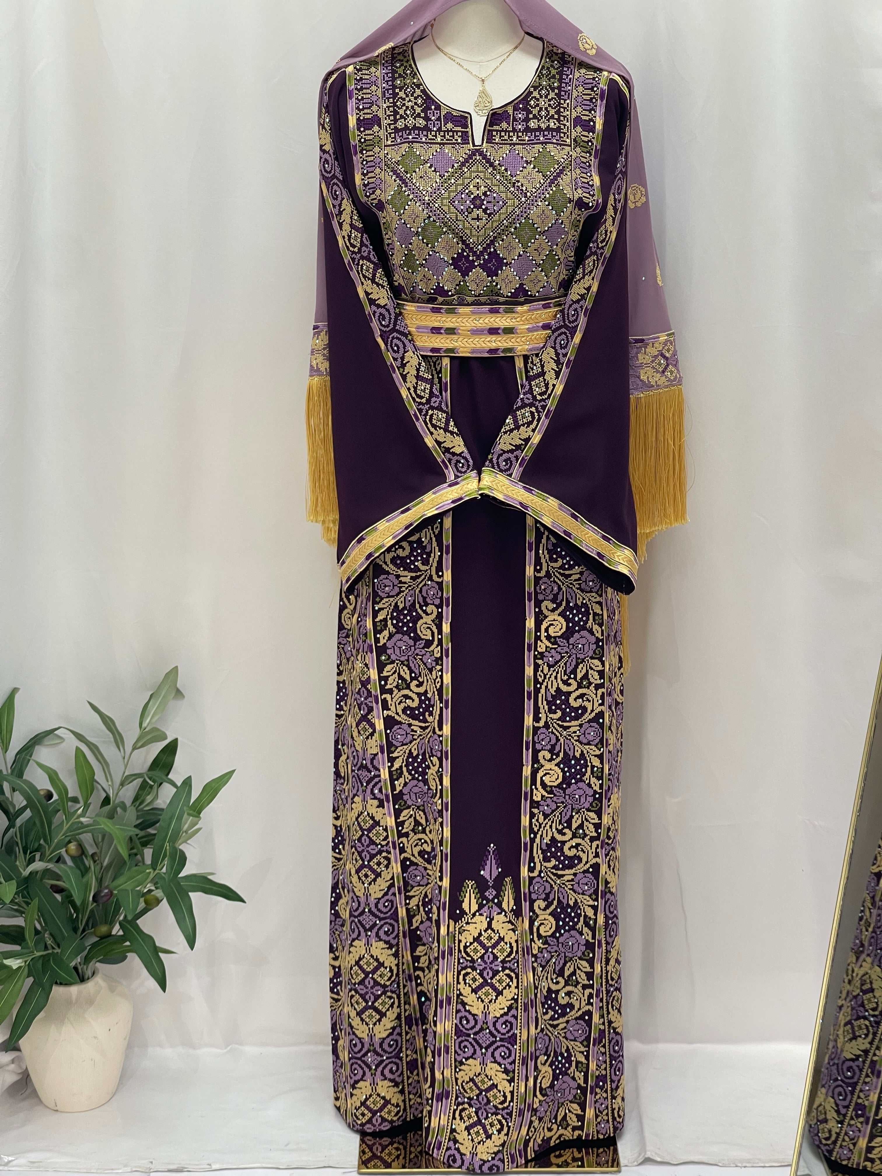 Arjwan Embroidered Thoub in rich purple with intricate gold patterns, perfect for cultural events