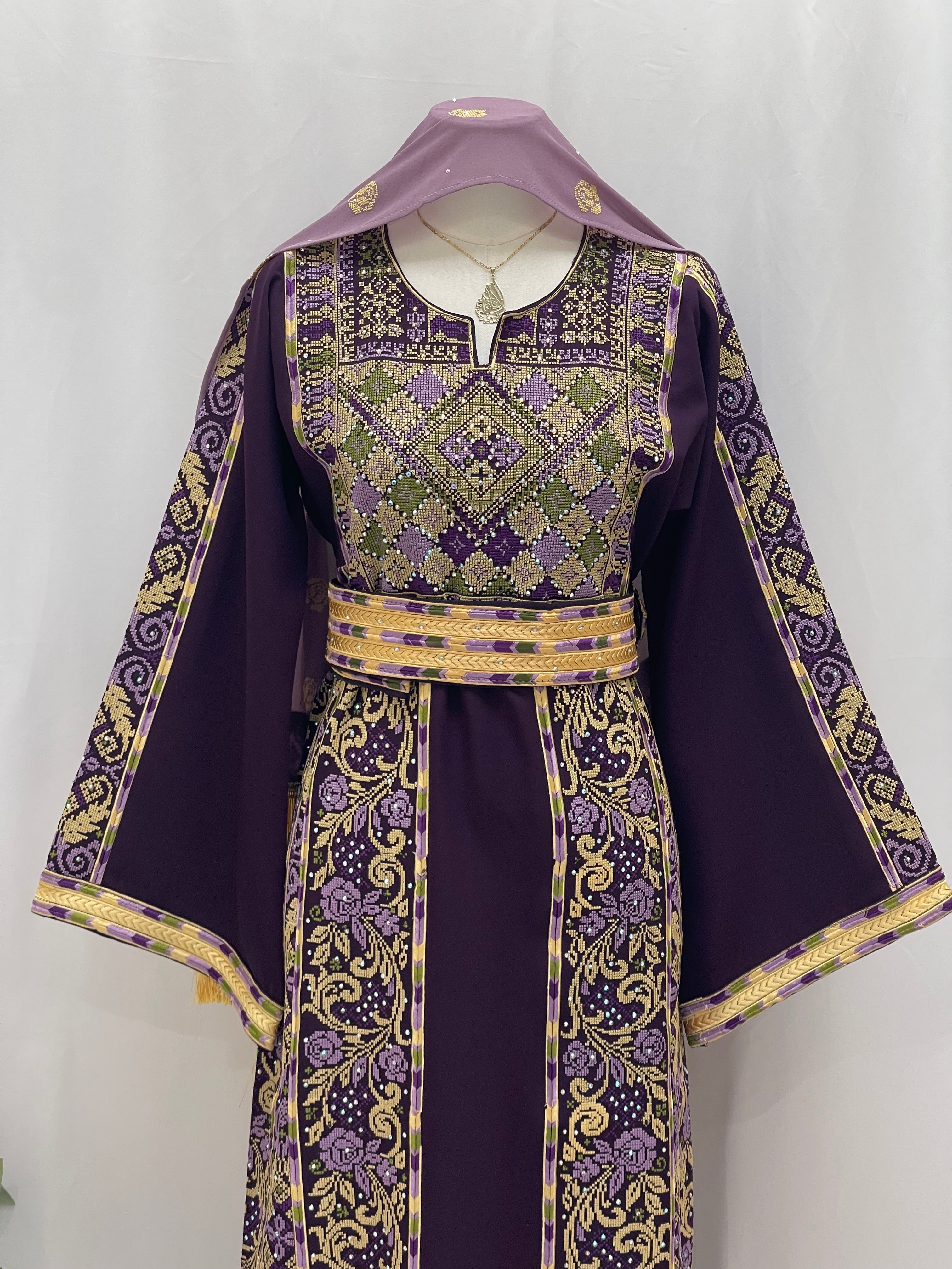 Arjwan Embroidered Thoub in purple with intricate designs and a matching hood, perfect for elegant occasions.