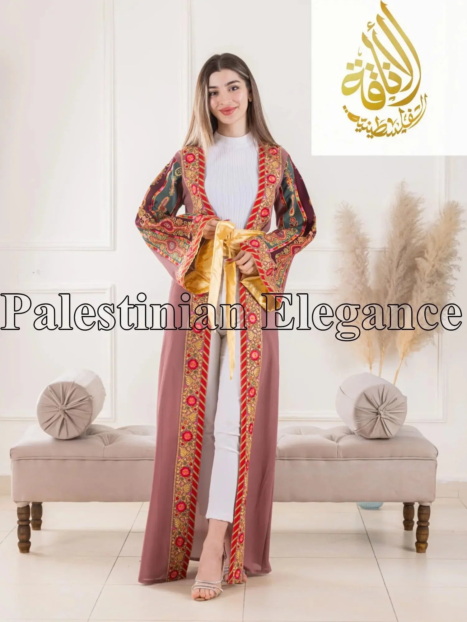 Aseel Malaka embroidered Cardigan by Palestinian Elegance worn by a woman with white inner outfit