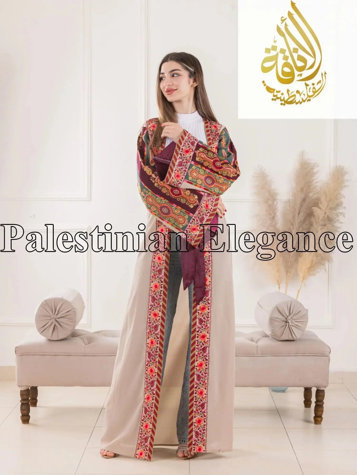Aseel Malaka embroidered Cardigan by Palestinian Elegance worn by a woman with beige pants in a stylish indoor setting