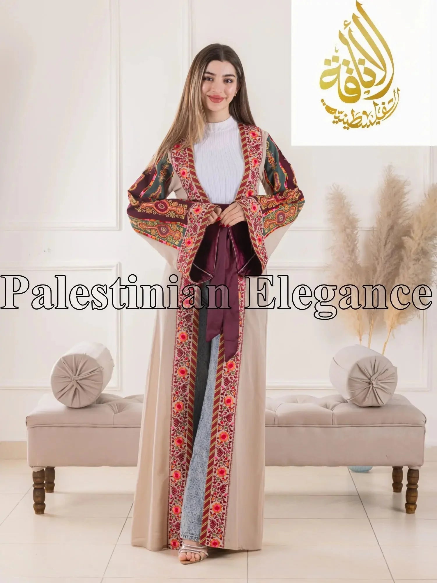 Aseel Malaka embroidered Cardigan by Palestinian Elegance worn by a woman with colorful traditional embroidery and maroon belt