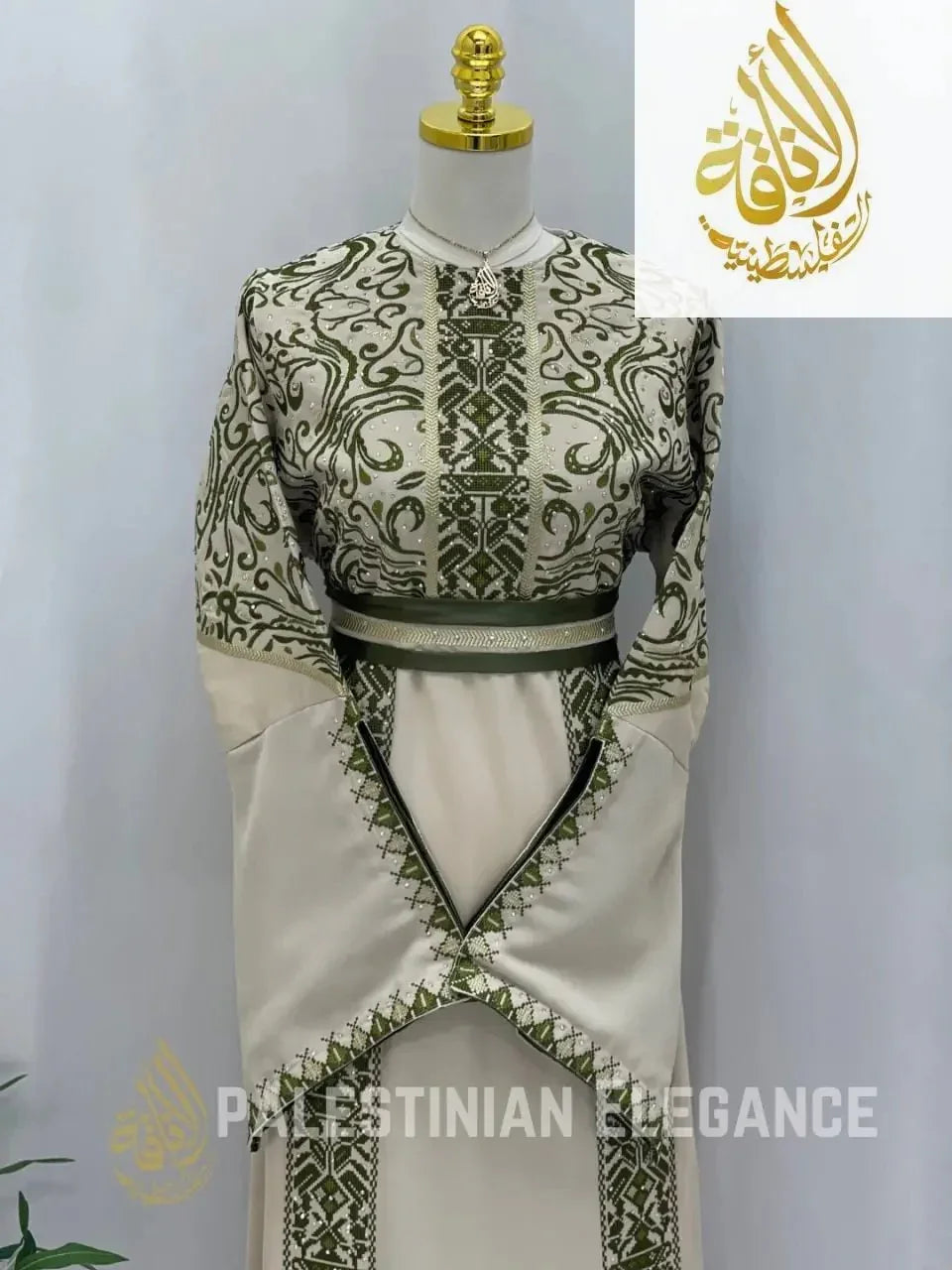 Palestinian Elegance traditional Palestinian embroidered thoub with intricate green embroidery on cream fabric