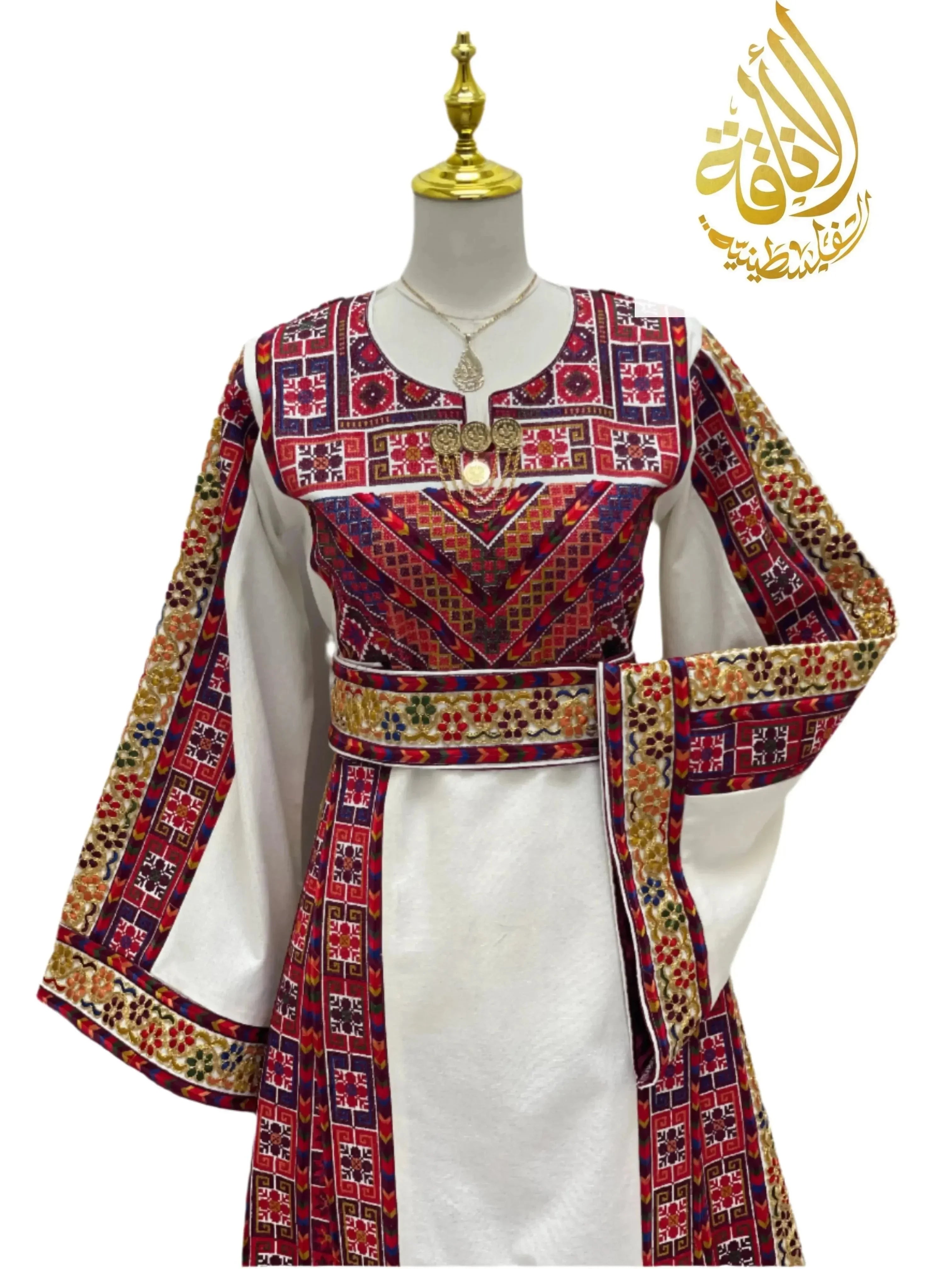 Azhar Atameen Embroidered Thoub by Palestinian Elegance featuring traditional red and white intricate embroidery on dress and sleeves