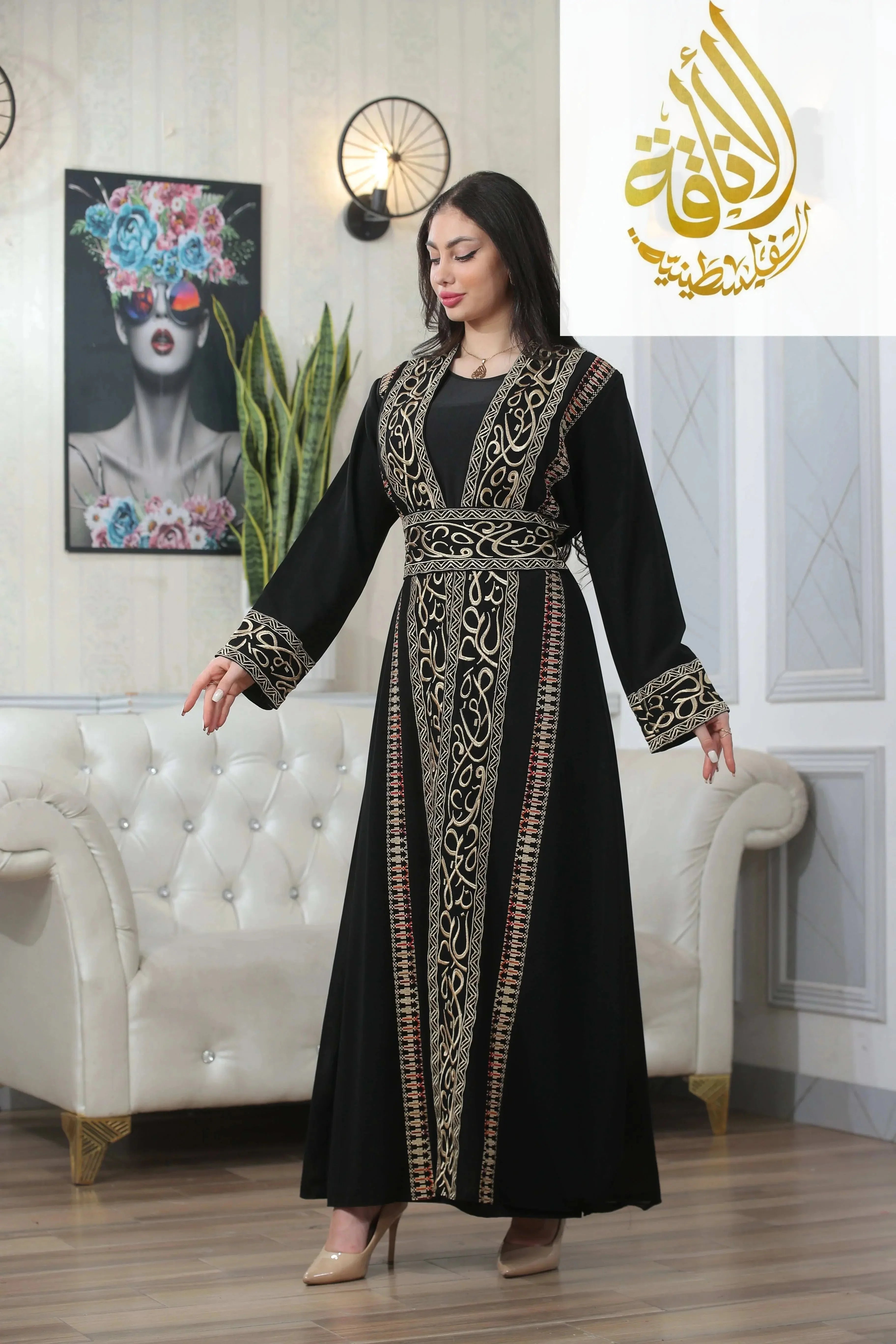 Black thoub by Palestinian Elegance featuring Basma Arabic letters with heritage embroidery Bisht design
