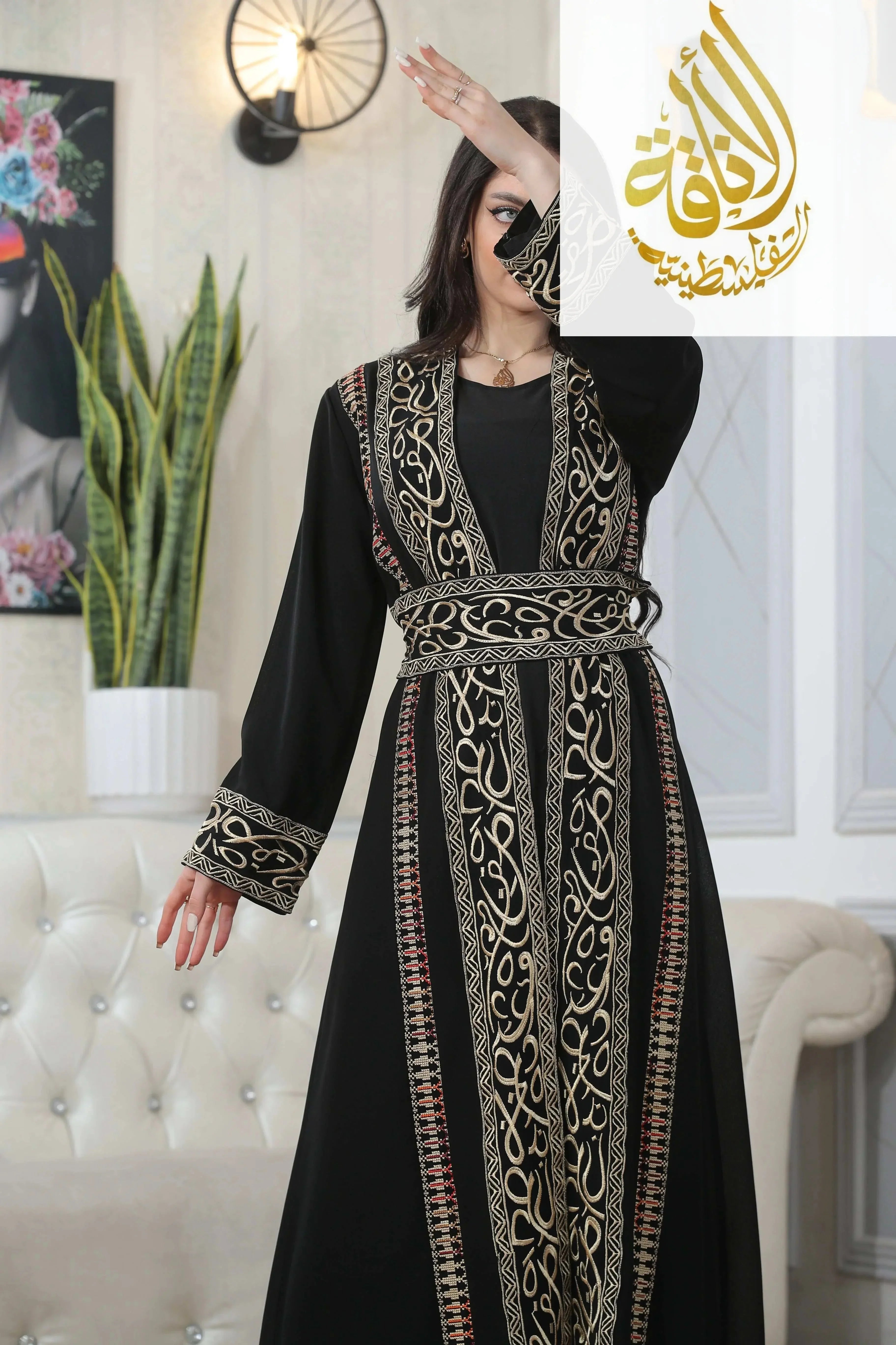 Black thoub with Basma Arabic letters with heritage embroidery Bisht by Palestinian Elegance, featuring detailed gold embroidery