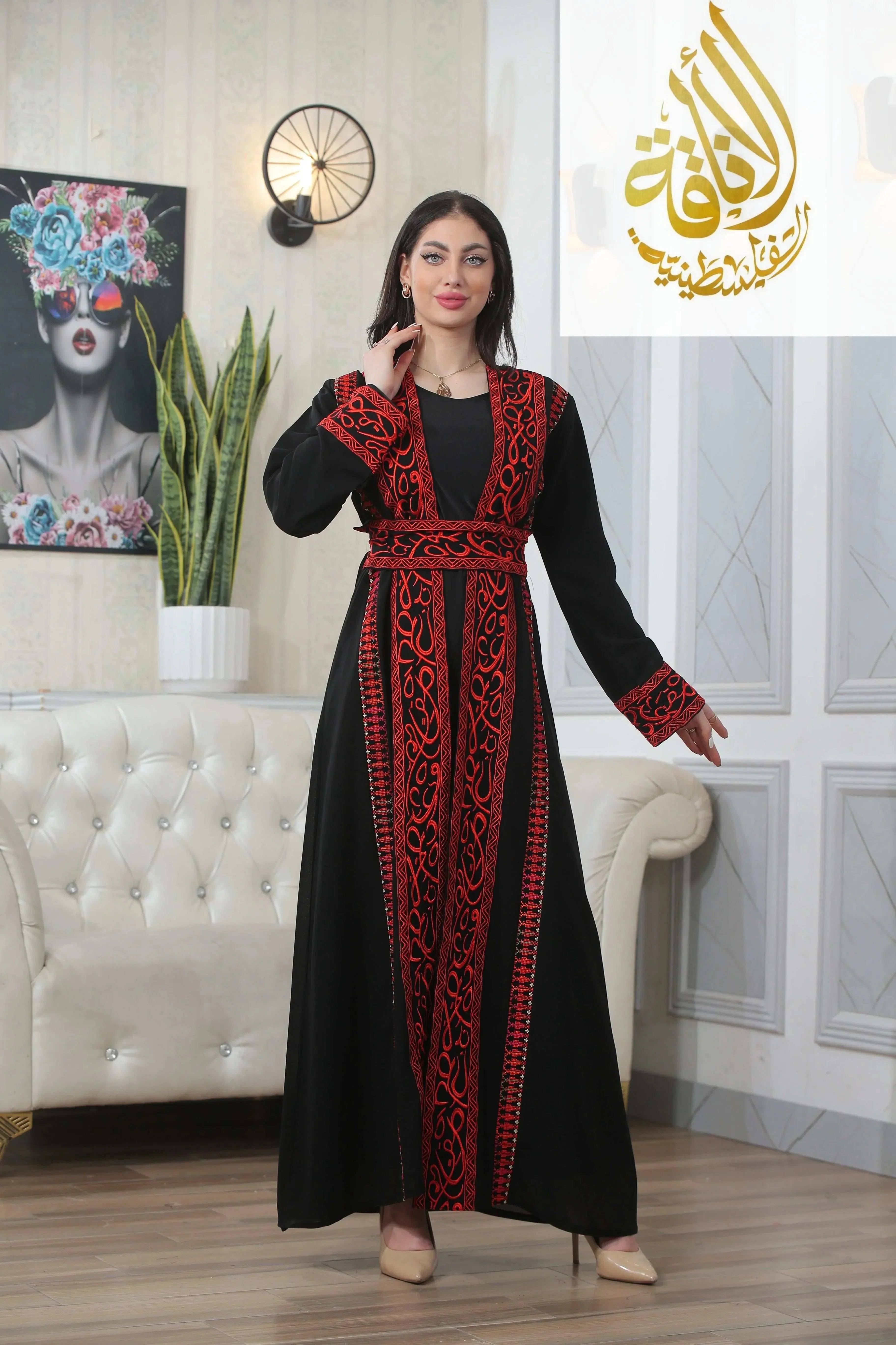 Black thoub with Basma Arabic letters with heritage embroidery Bisht in red worn by woman with long sleeves