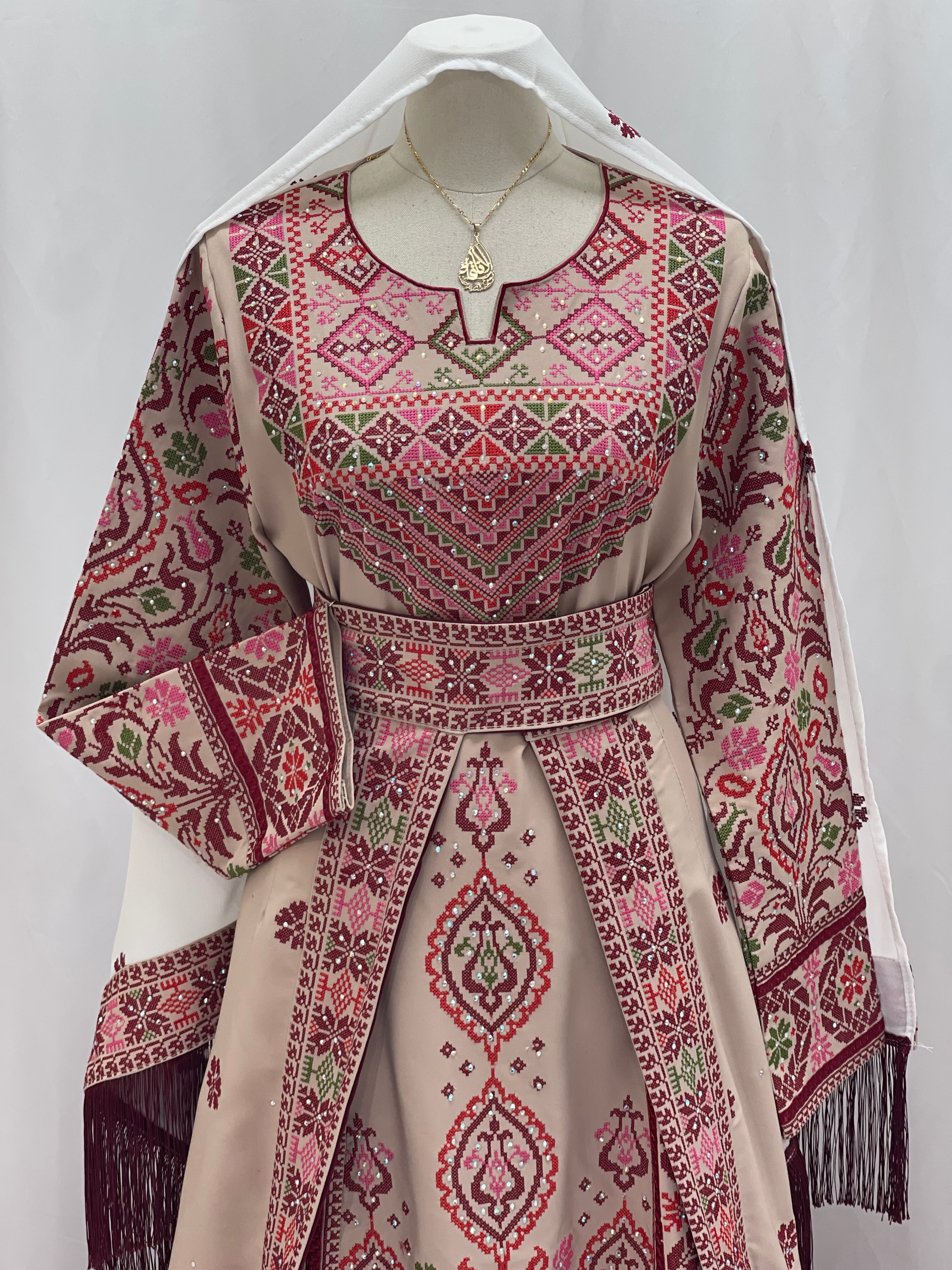 Elegant Bride of Roses Thobe featuring intricate embroidery and intricate design details for special occasions.