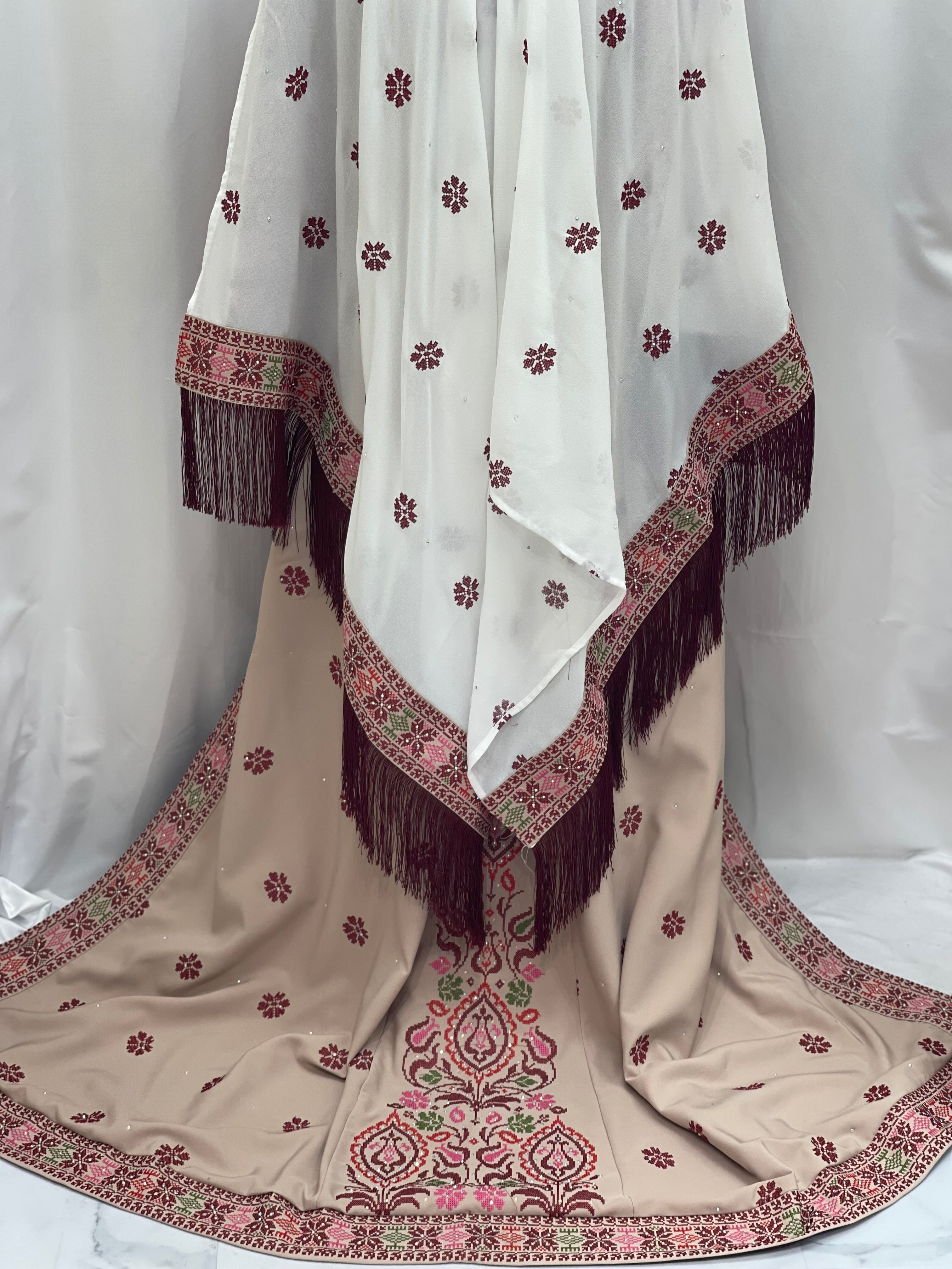 Bride of Roses Thobe featuring elegant embroidery and fringed details for traditional bridal wear