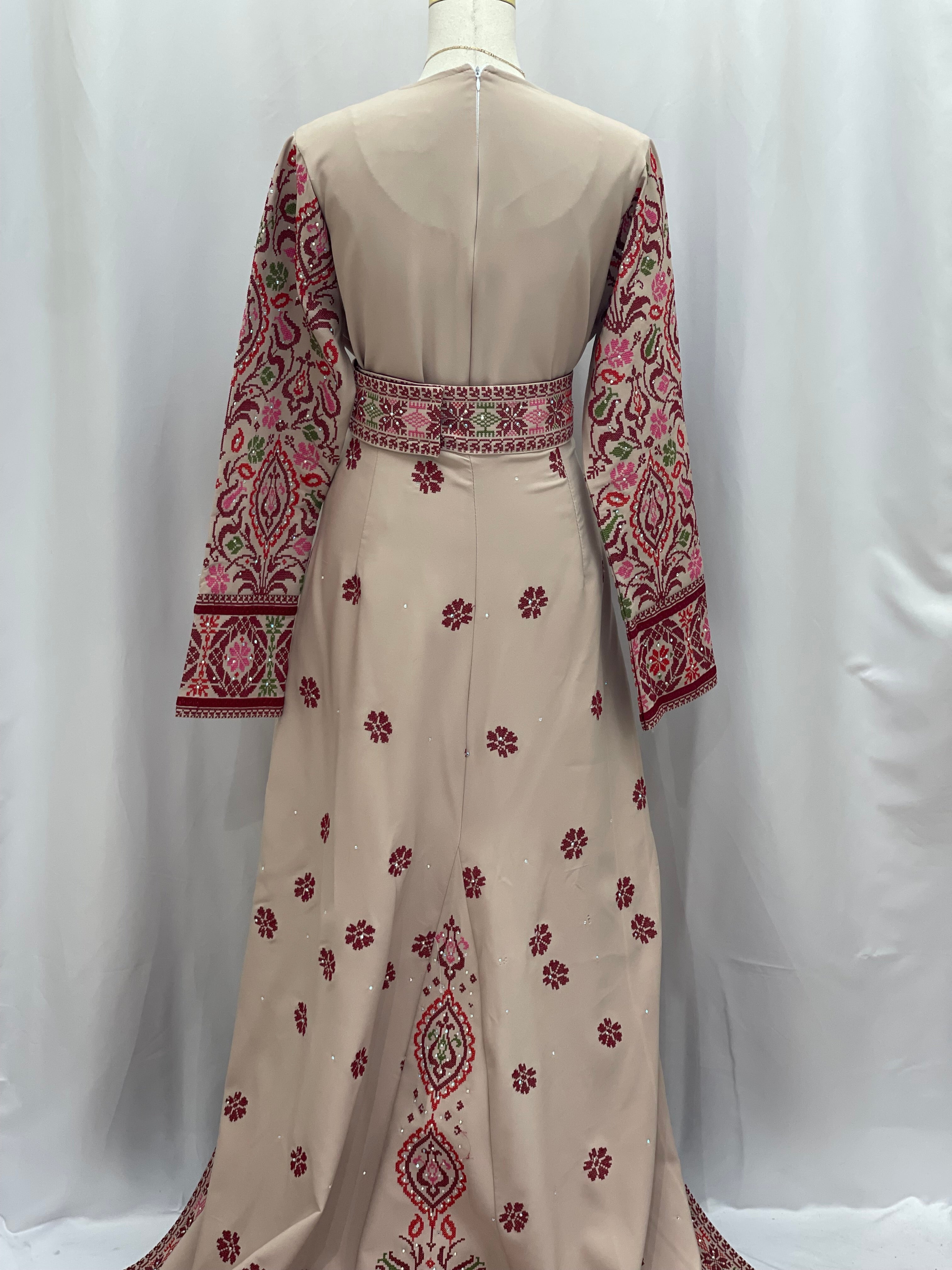 Back view of the Bride of Roses Thobe featuring intricate embroidery and elegant long sleeves