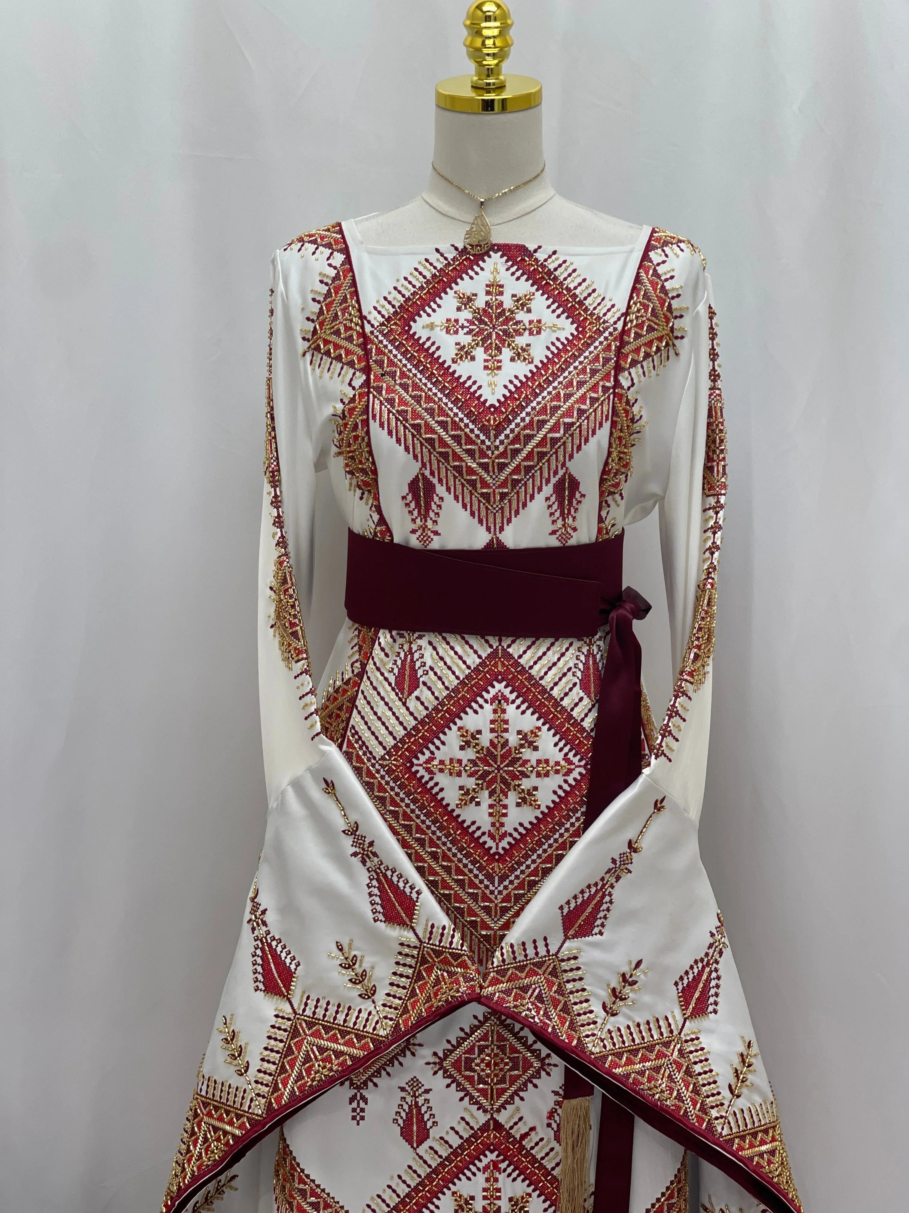 Orient Modren Embroidered Dress Palestinian Elegance white thobe with red geometric embroidery and maroon waist sash