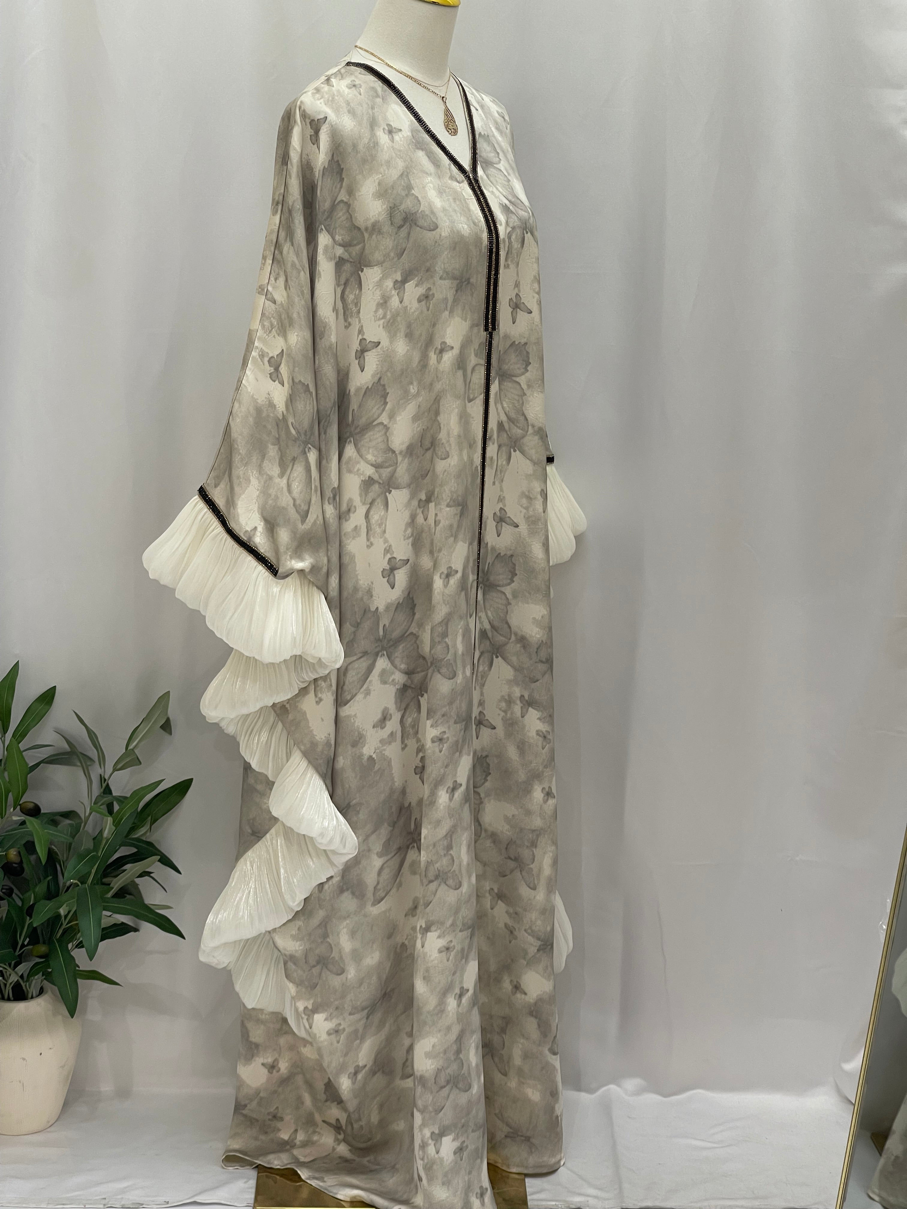 Palestinian Elegance butterfly abaya free size with ruffled white sleeves and elegant gray pattern
