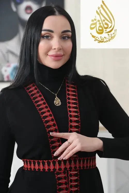 Palestinian Elegance embroidered chiffon vest with traditional red and black embroidery worn over black top