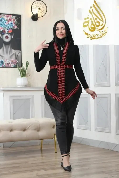 Palestinian Elegance embroidered chiffon vest in black with red geometric embroidery worn over black outfit