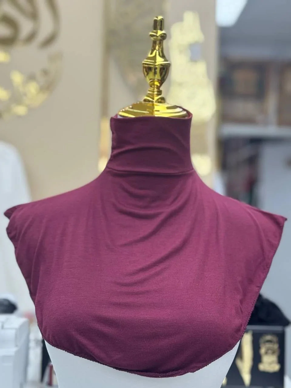 Palestinian Elegance maroon Cotton Lightweight Turtle Neck displayed on gold topped mannequin torso for modest layering