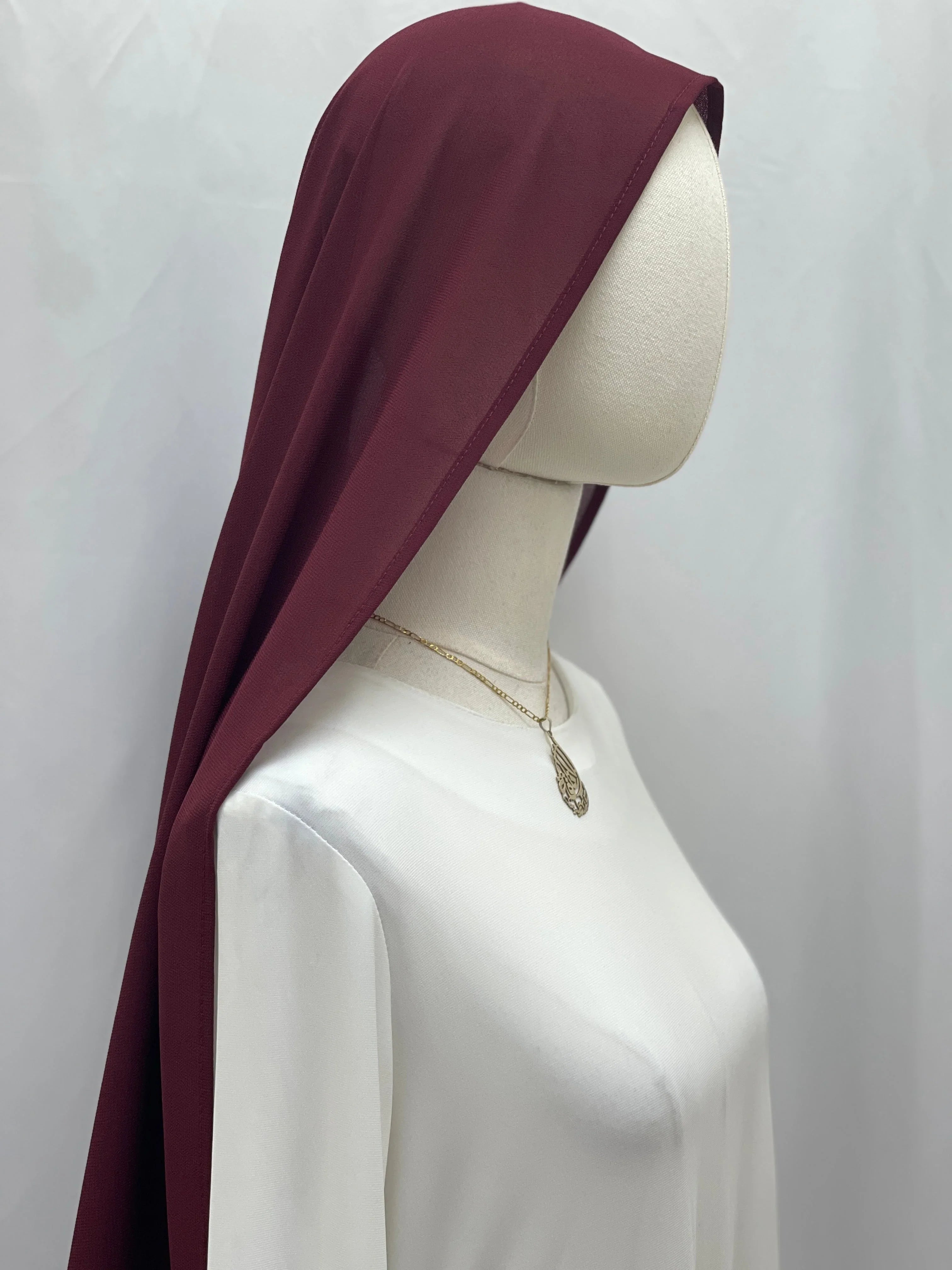 Dark Maroon Khirka With Tassel draped on mannequin over white tunic by Palestinian Elegance for modest wear