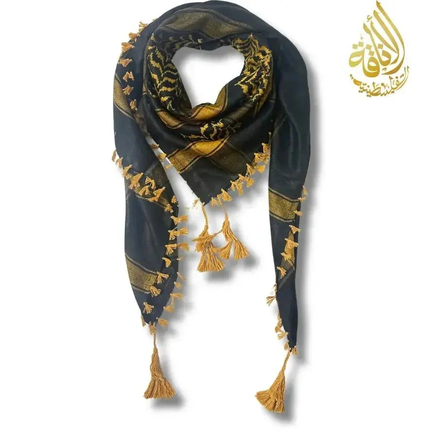 Handcrafted Palestinian kuffiyeh scarf in black and gold with tassels by Palestinian Elegance