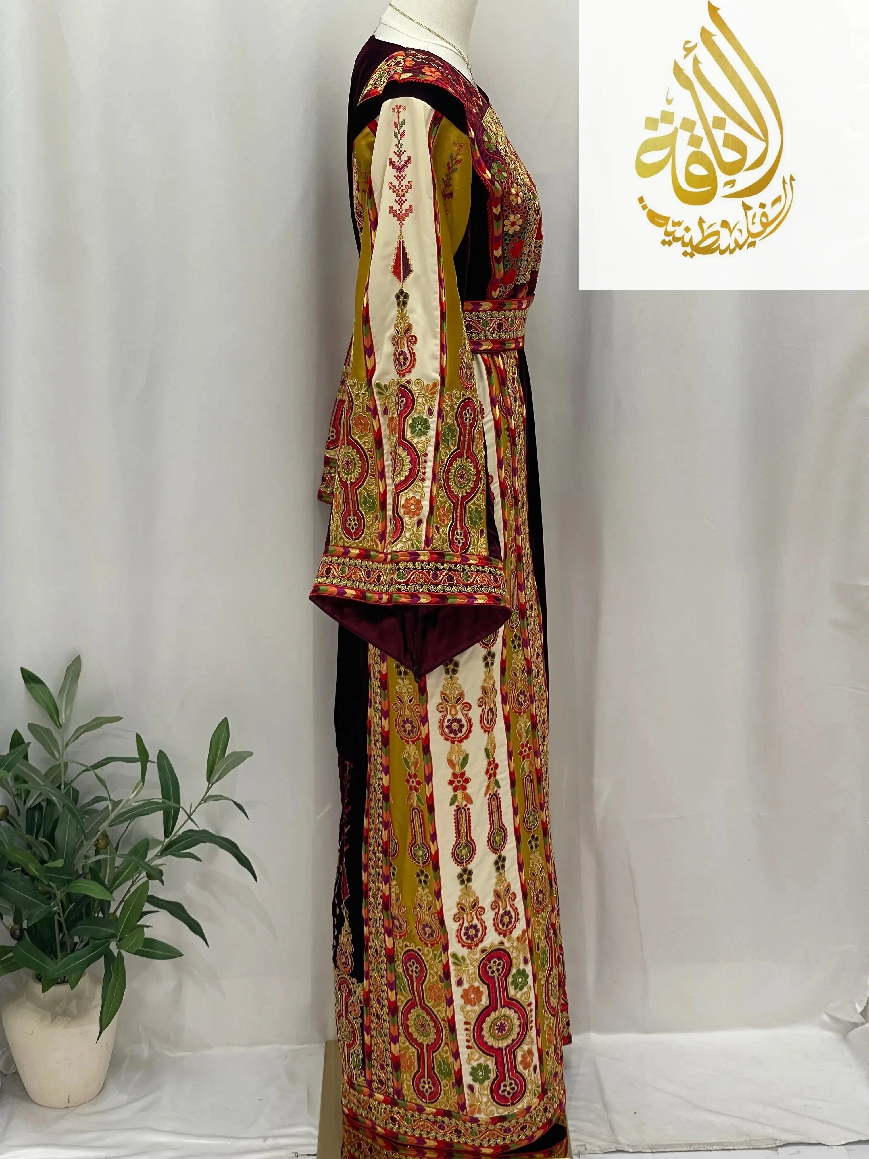 Deep Burgundy Palestinian Embroidered thobe by Palestinian Elegance with intricate traditional patterns