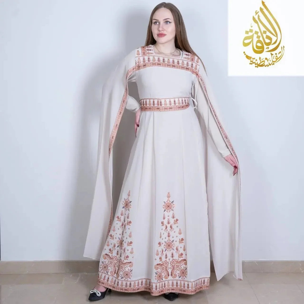 Palestinian Elegance embroidered Palestinian dress in beige with intricate brown traditional embroidery