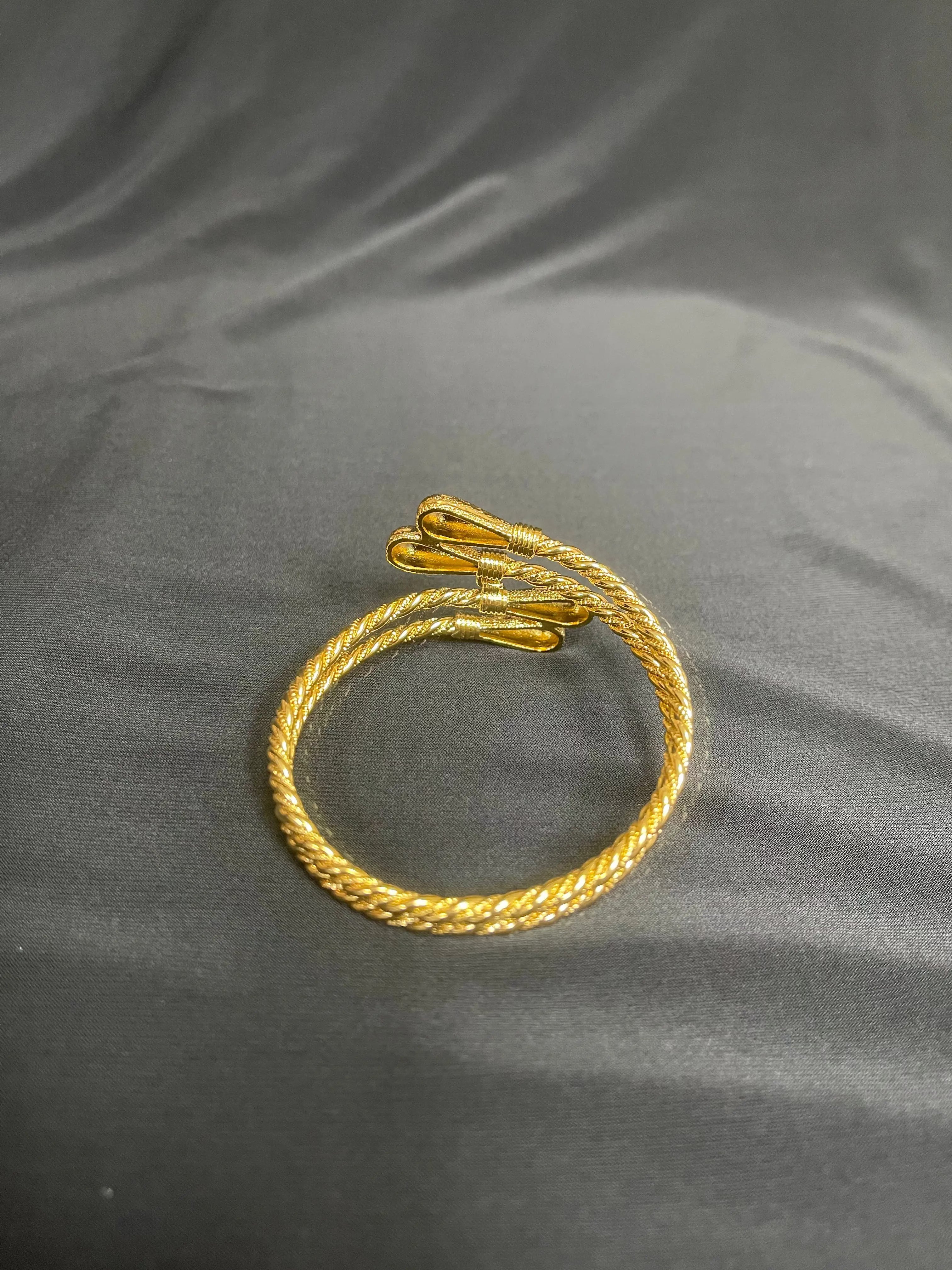Palestinian gold bangle bracelet by Palestinian Elegance in imitated gold with twisted design