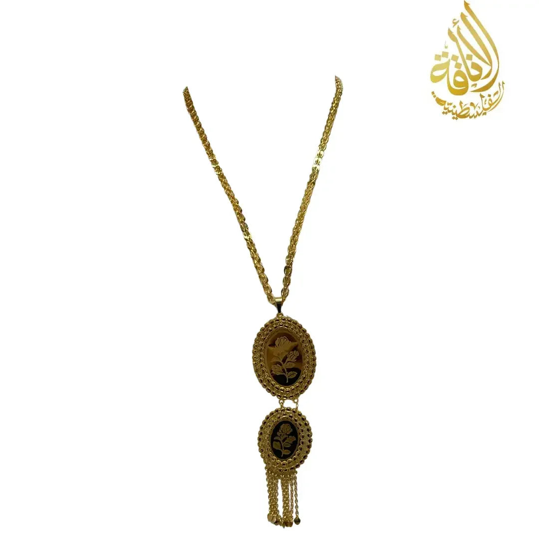 Palestinian Elegance imitated gold oval necklace with detailed floral pendants and hanging chain tassels