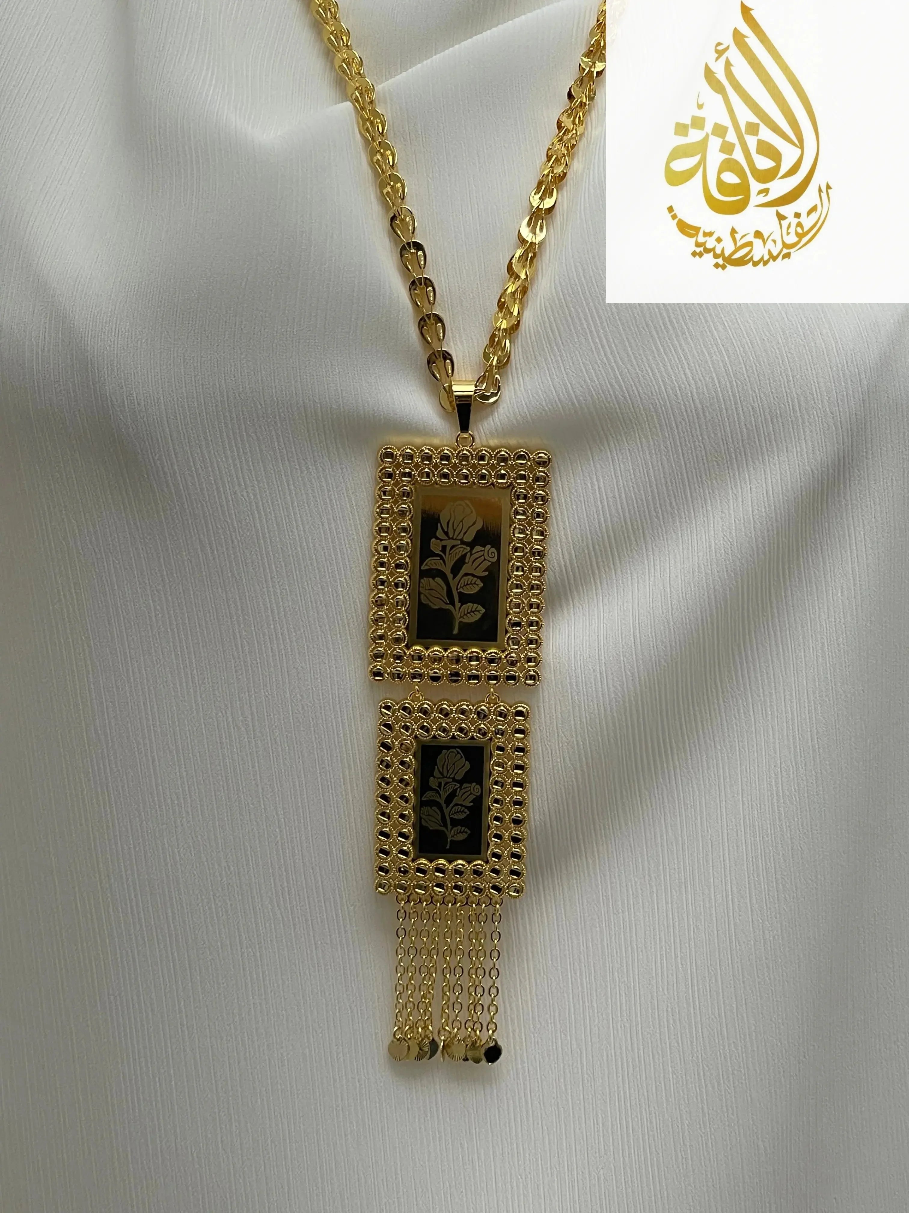 Palestinian embroidered gold necklace with rectangular floral pendants and gold chain from Palestinian Elegance