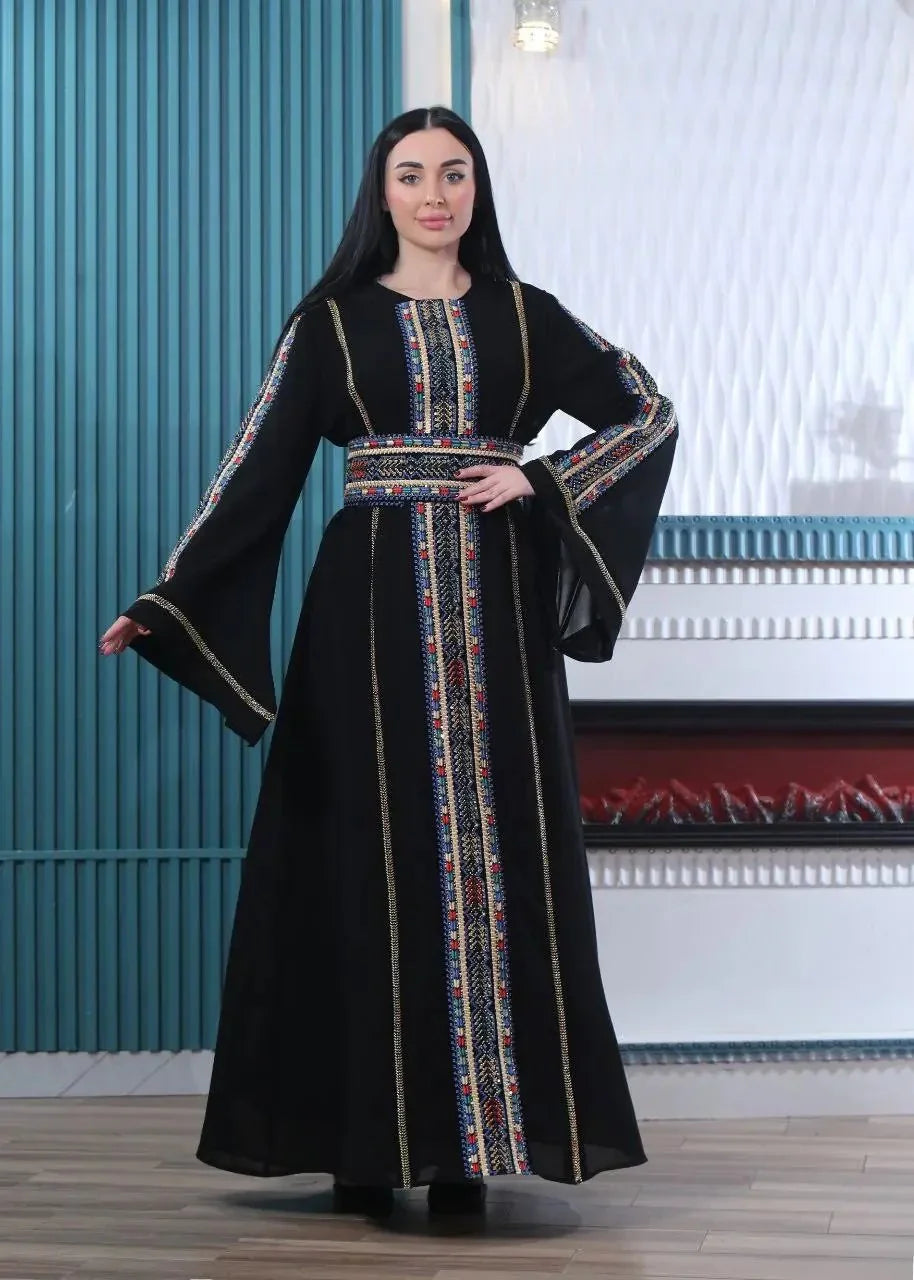 Elegant black embroidered Palestinian kaftan with colorful geometric patterns by Palestinian Elegance