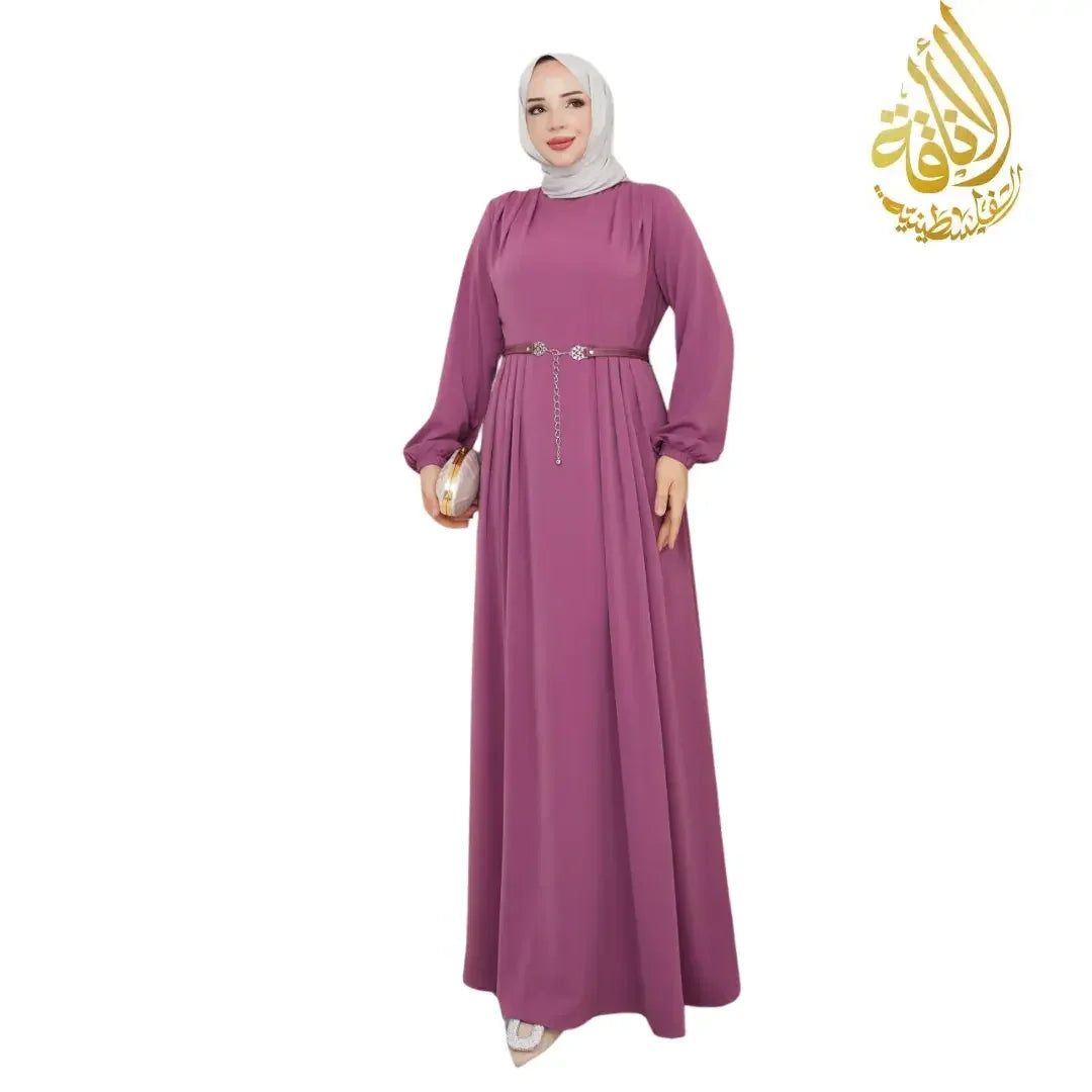 Elegant long dress for special occasions in mauve with long sleeves and belted waist by Palestinian Elegance