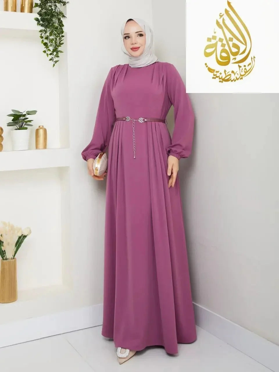 Palestinian Elegance elegant long dress for special occasions in mauve with long sleeves and belt detail