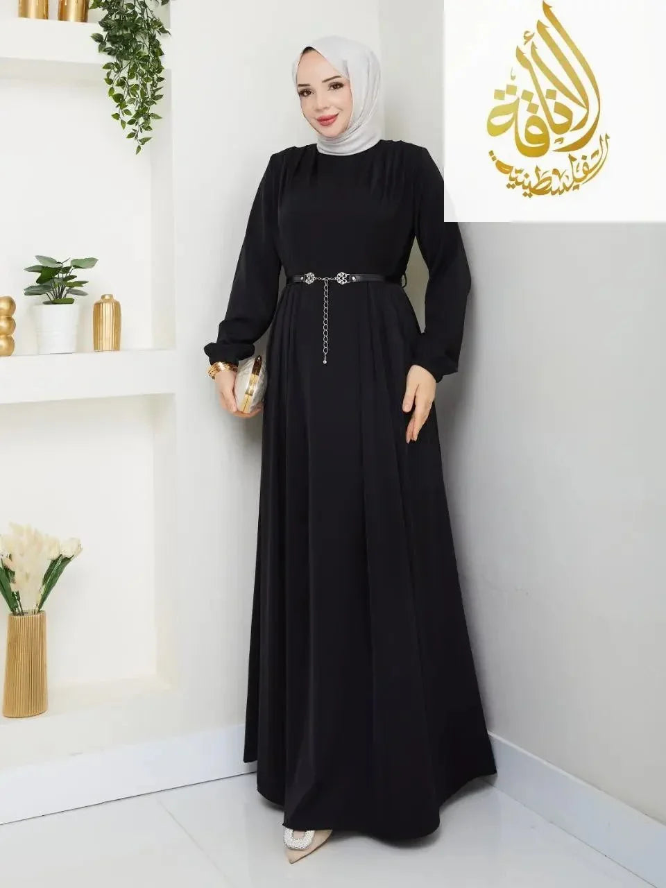 Palestinian Elegance black elegant long dress for special occasions with belt and long sleeves