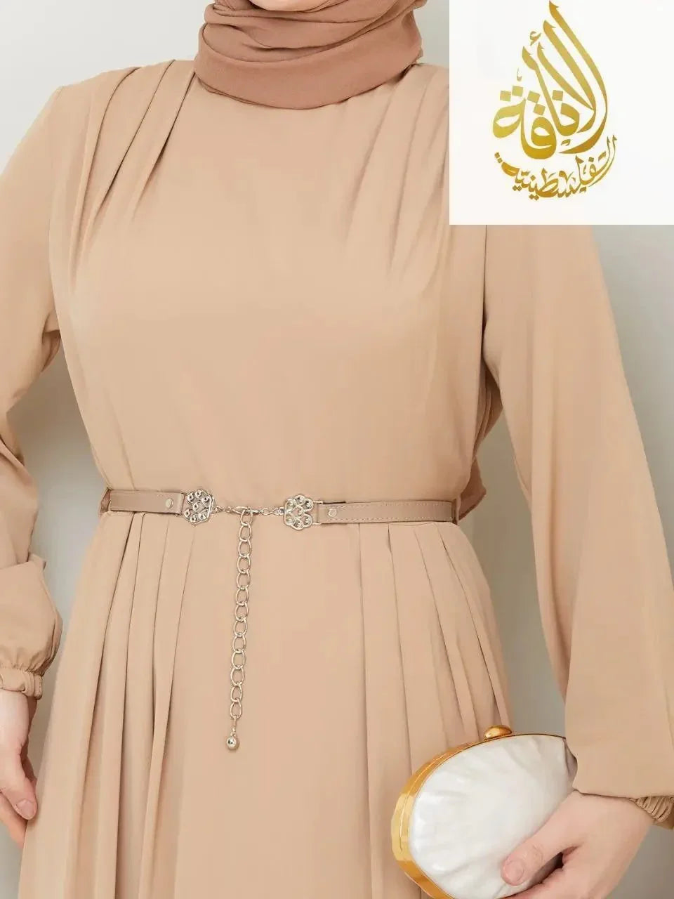 Palestinian Elegance beige elegant long dress for special occasions with belt and pleated design