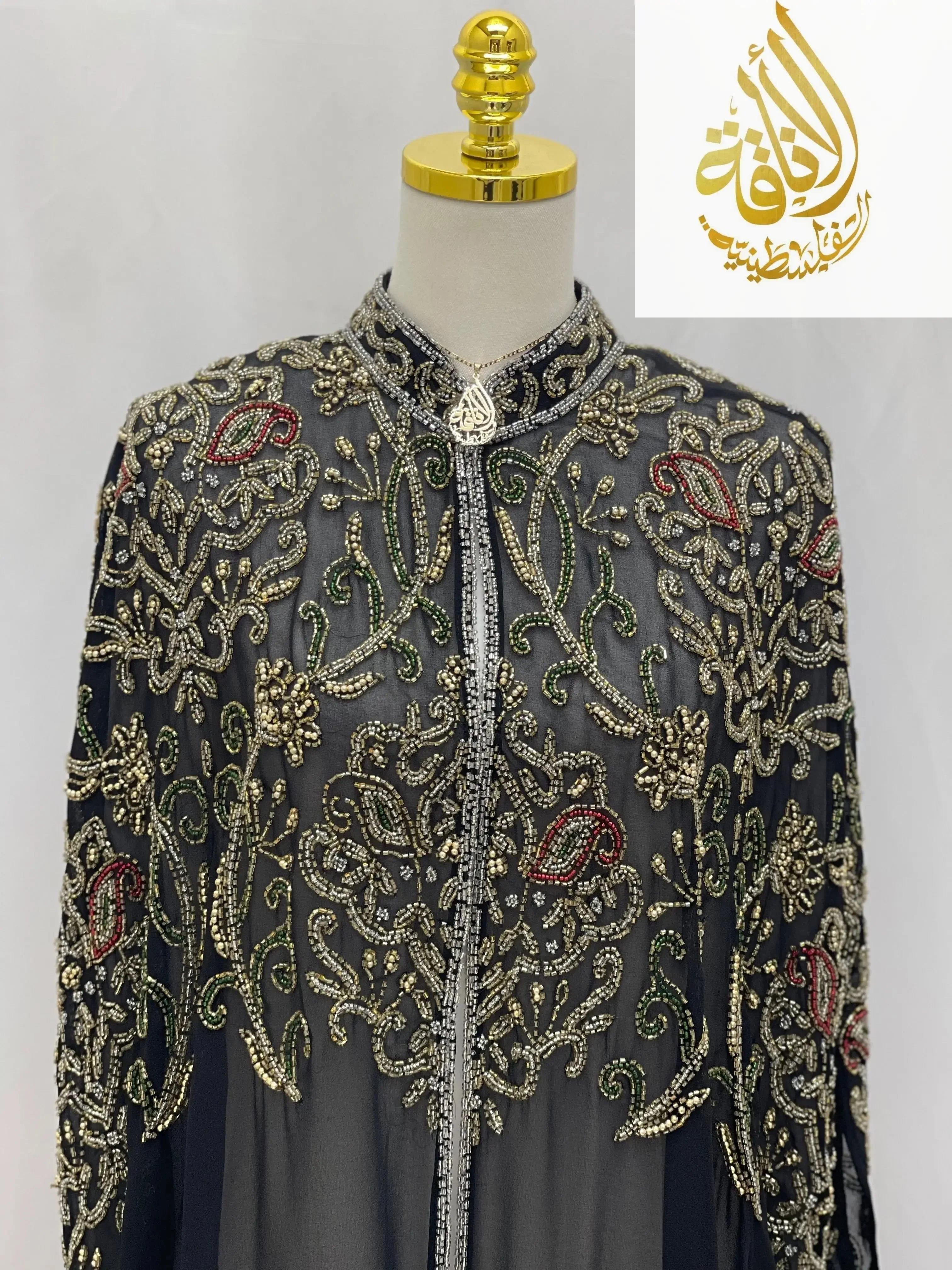 Palestinian Elegance black cardigan with intricate beadwork and embroidery in elegant modest fashion cape style
