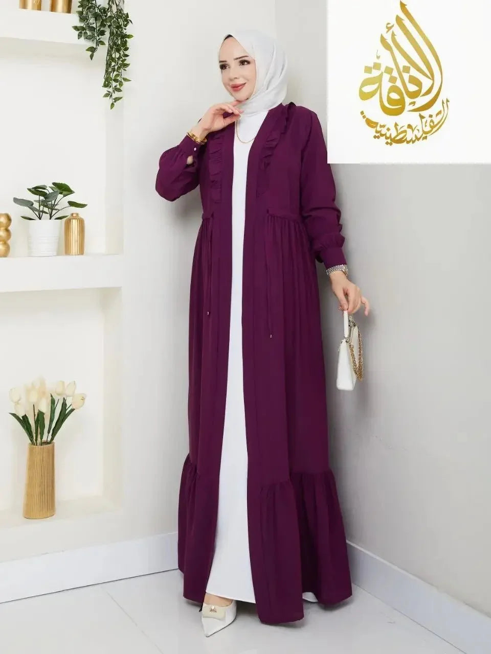 Palestinian Elegance elegant purple cardigan dress worn over white outfit with long sleeves and ruffle details