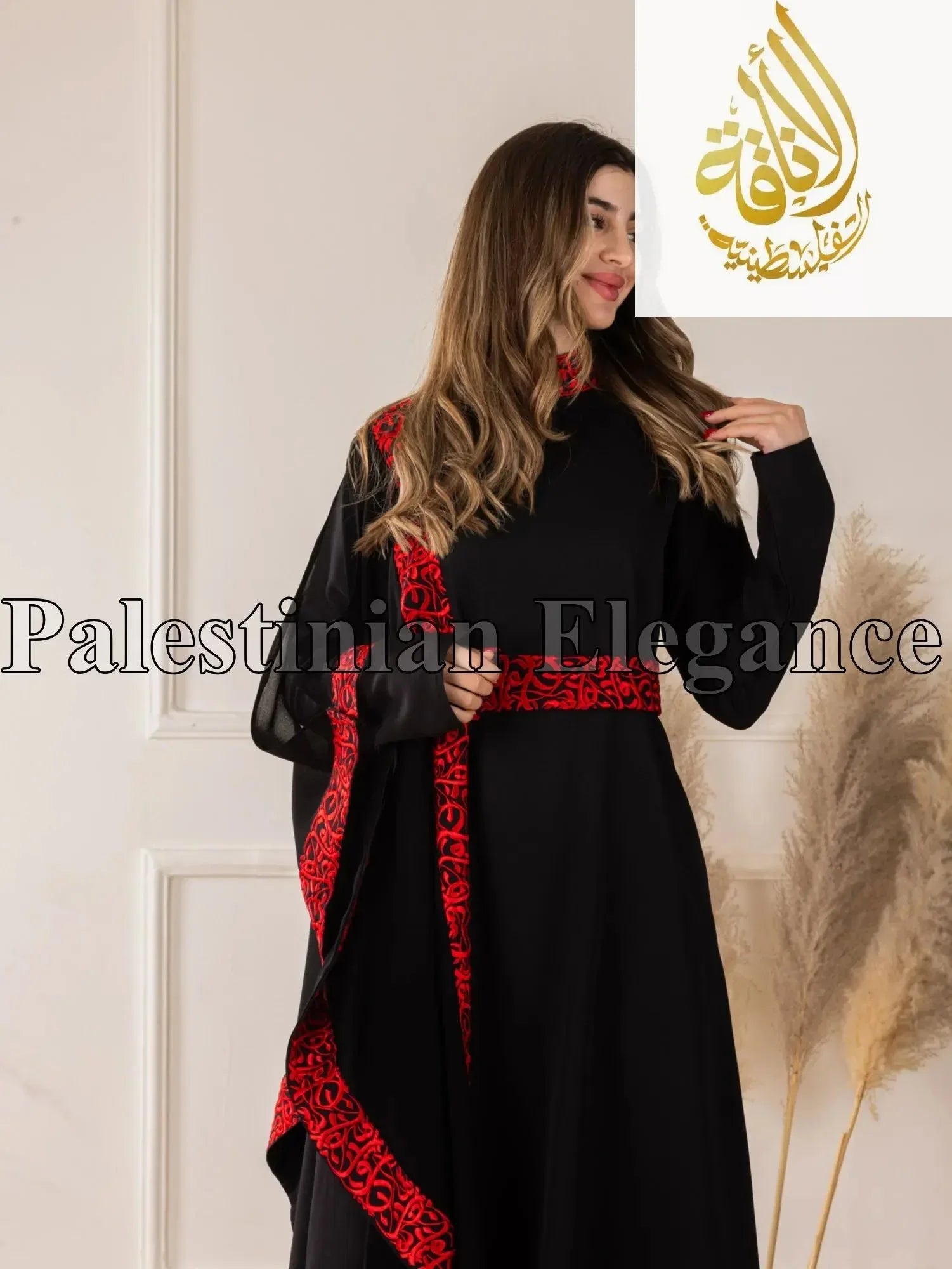 Palestinian Elegance embroidered abaya with Arabic letters featuring red embroidery on black fabric