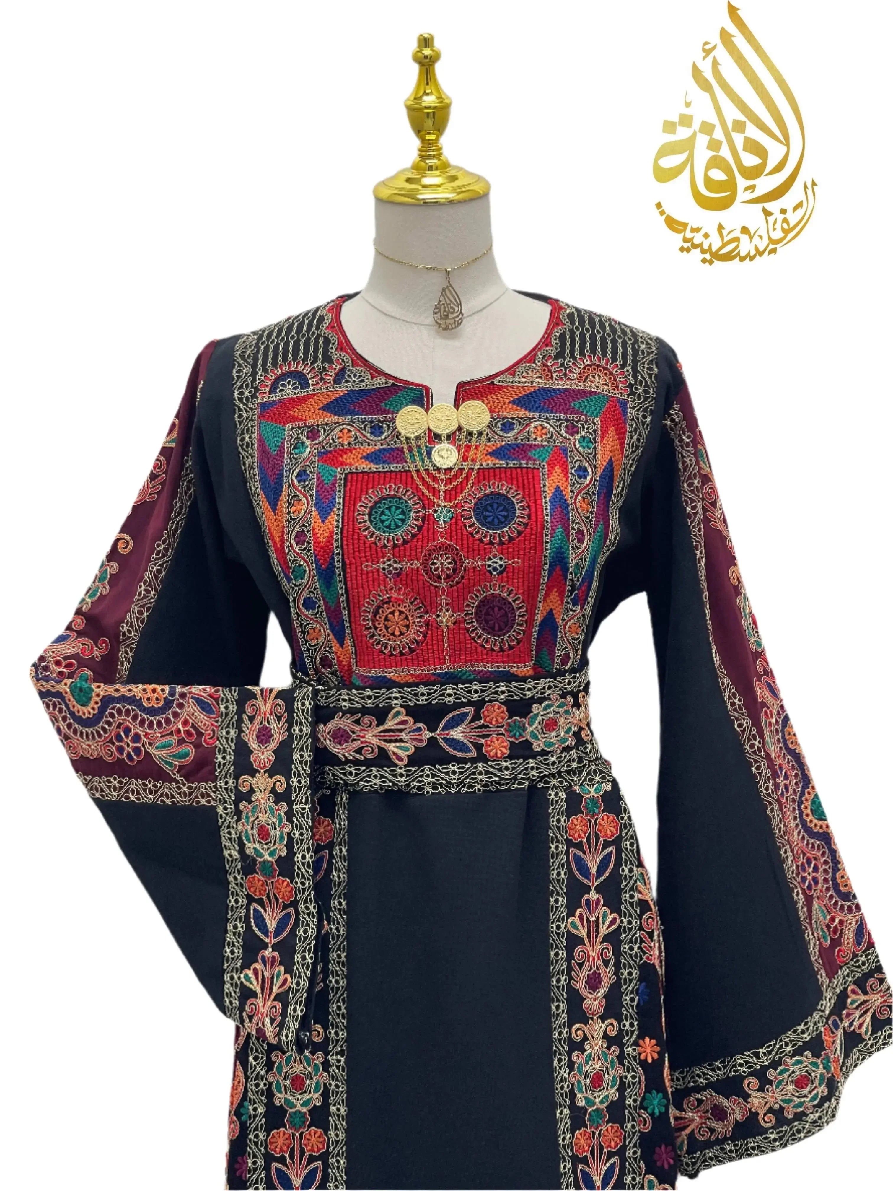 Embroidered Kasab Soft Atmeen Thoub by Palestinian Elegance with colorful geometric patterns on black fabric