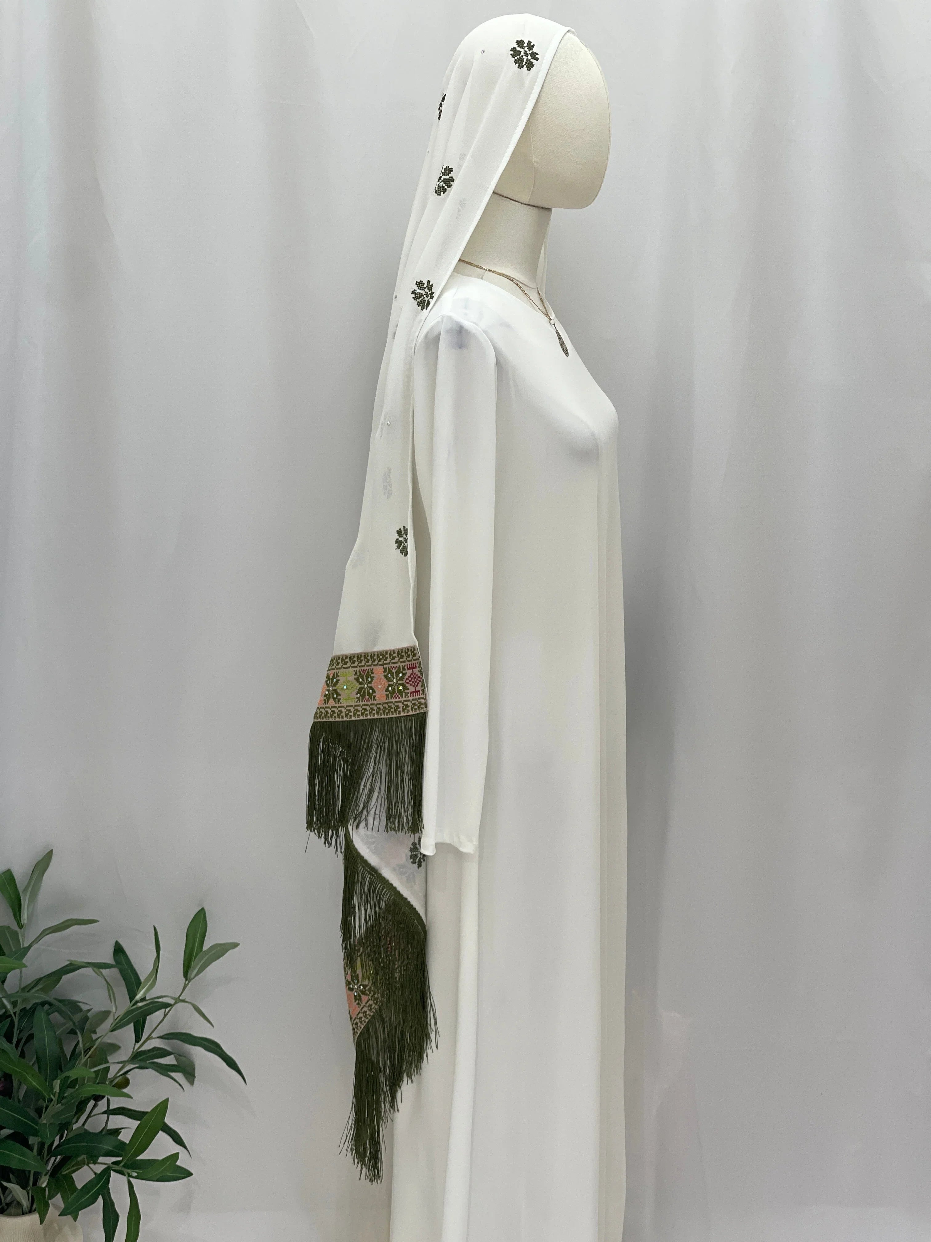 Elegant white Embroidered Khirka With tassels showcasing intricate designs and a flowing silhouette