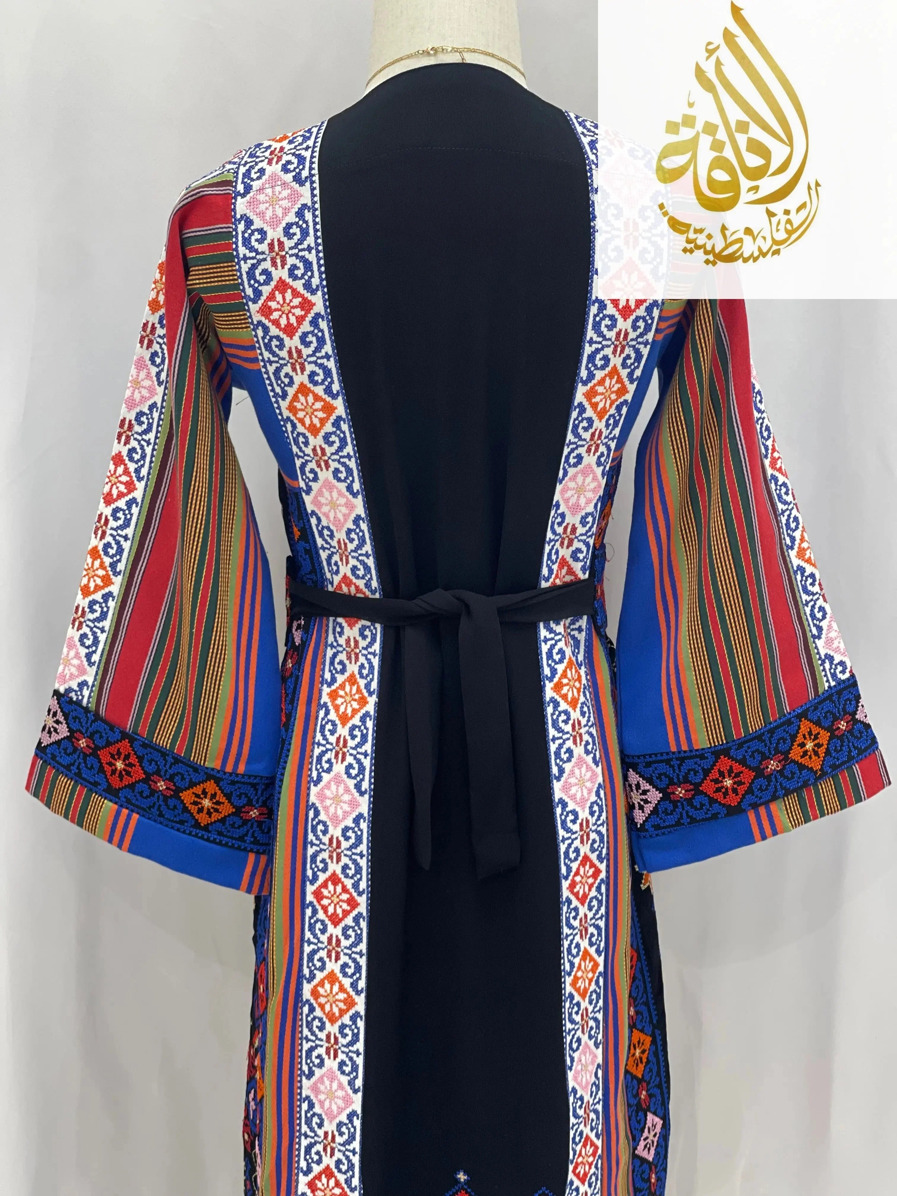 Palestinian Elegance embroidered thoub for teens with colorful traditional embroidery and striped sleeves