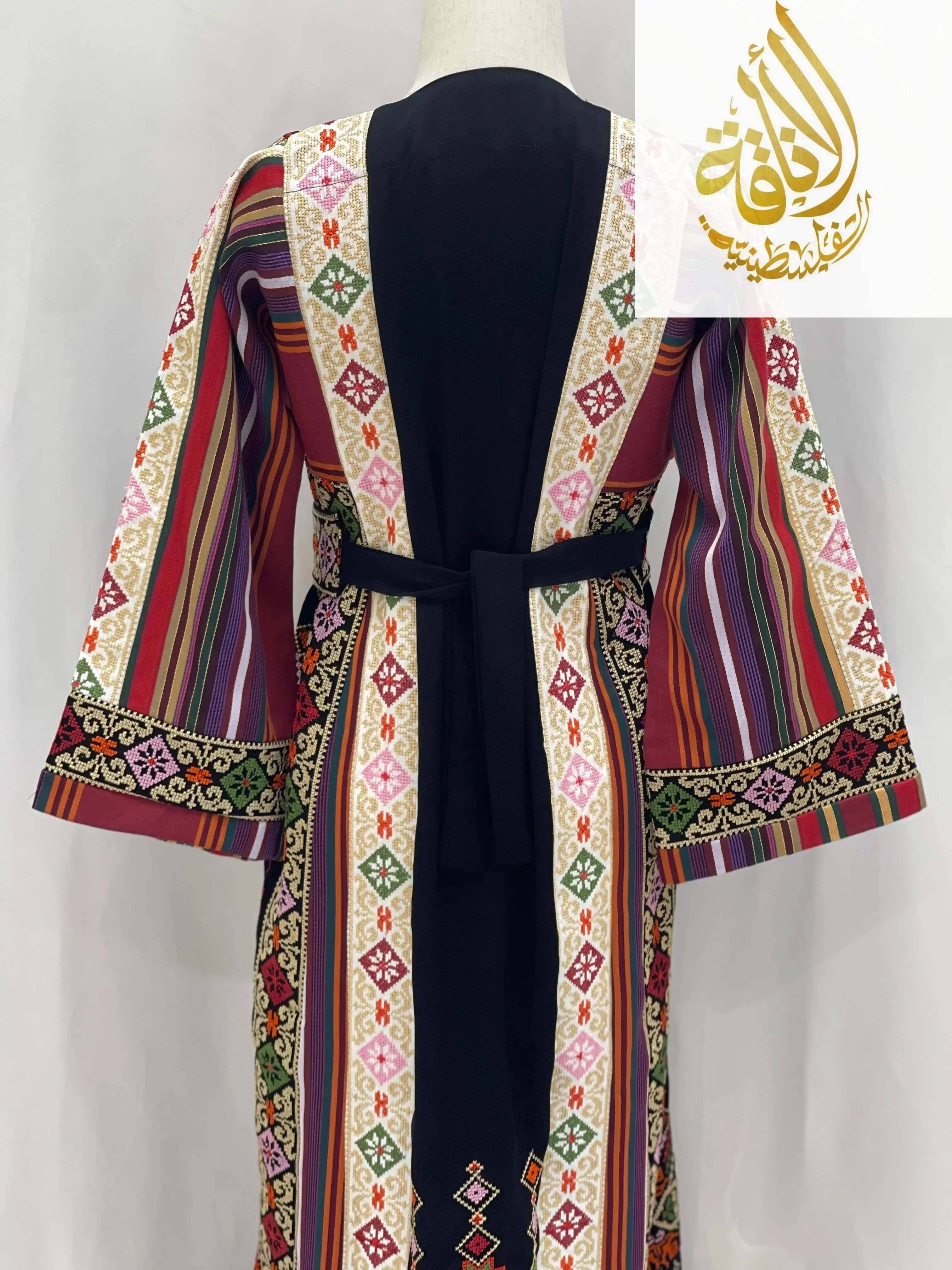 Palestinian Elegance embroidered thoub for teens featuring colorful traditional geometric embroidery and striped sleeves