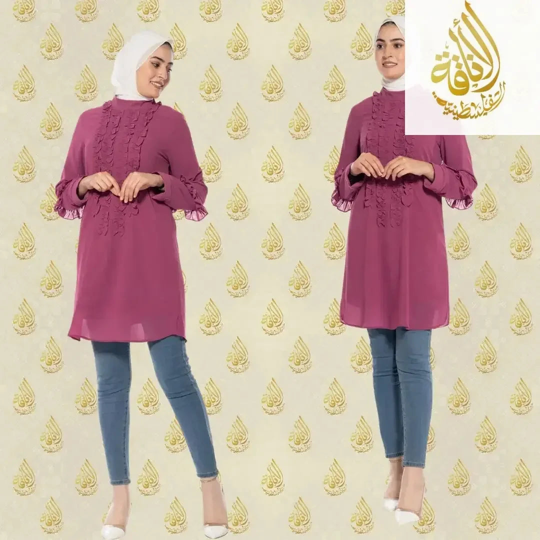 Palestinian Elegance luxury women's embroidered shirt in purple with ruffle details and long sleeves, styled with jeans