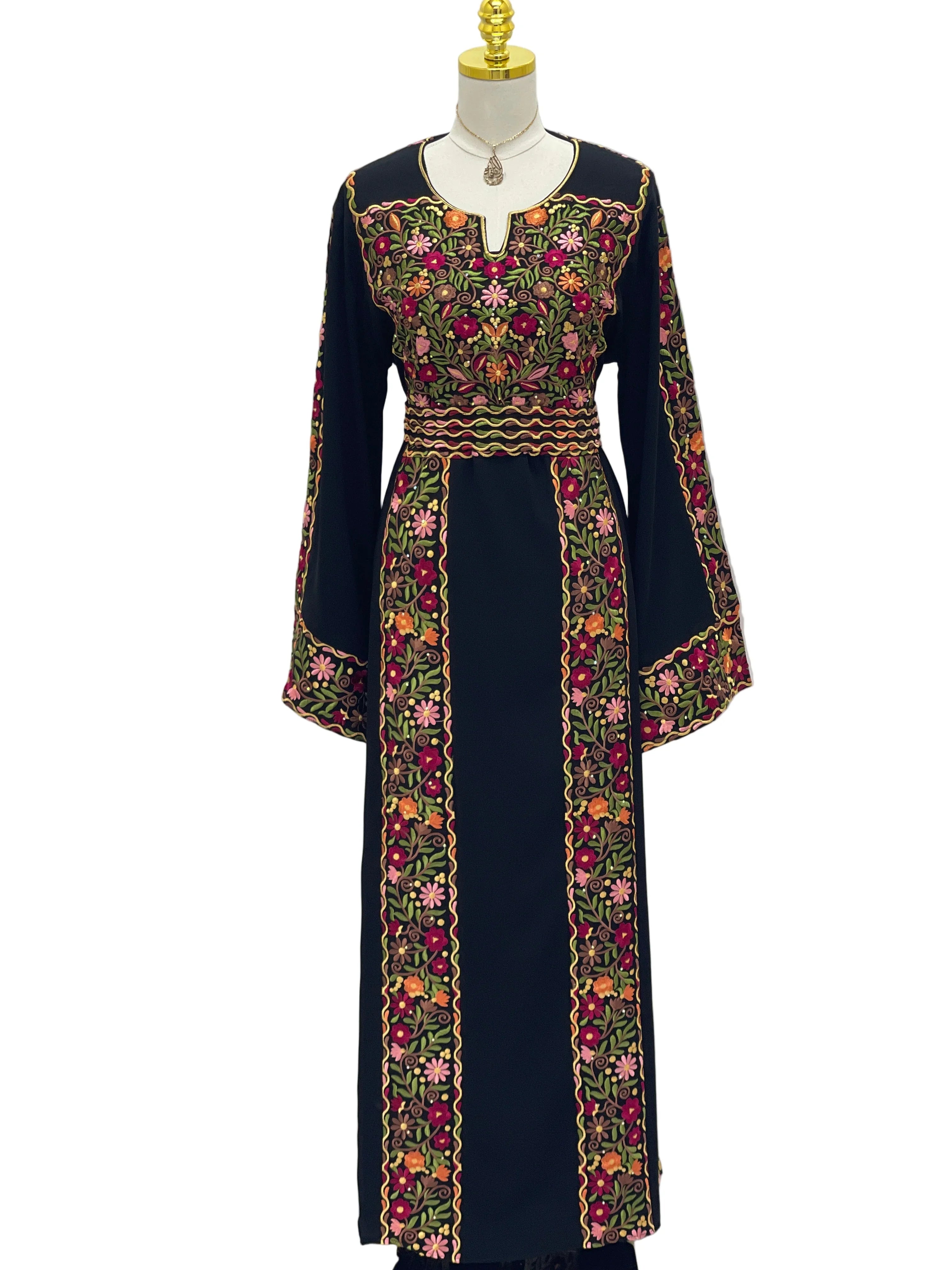 Floral Essence Embroidered Thobe featuring intricate floral designs and elegant long sleeves