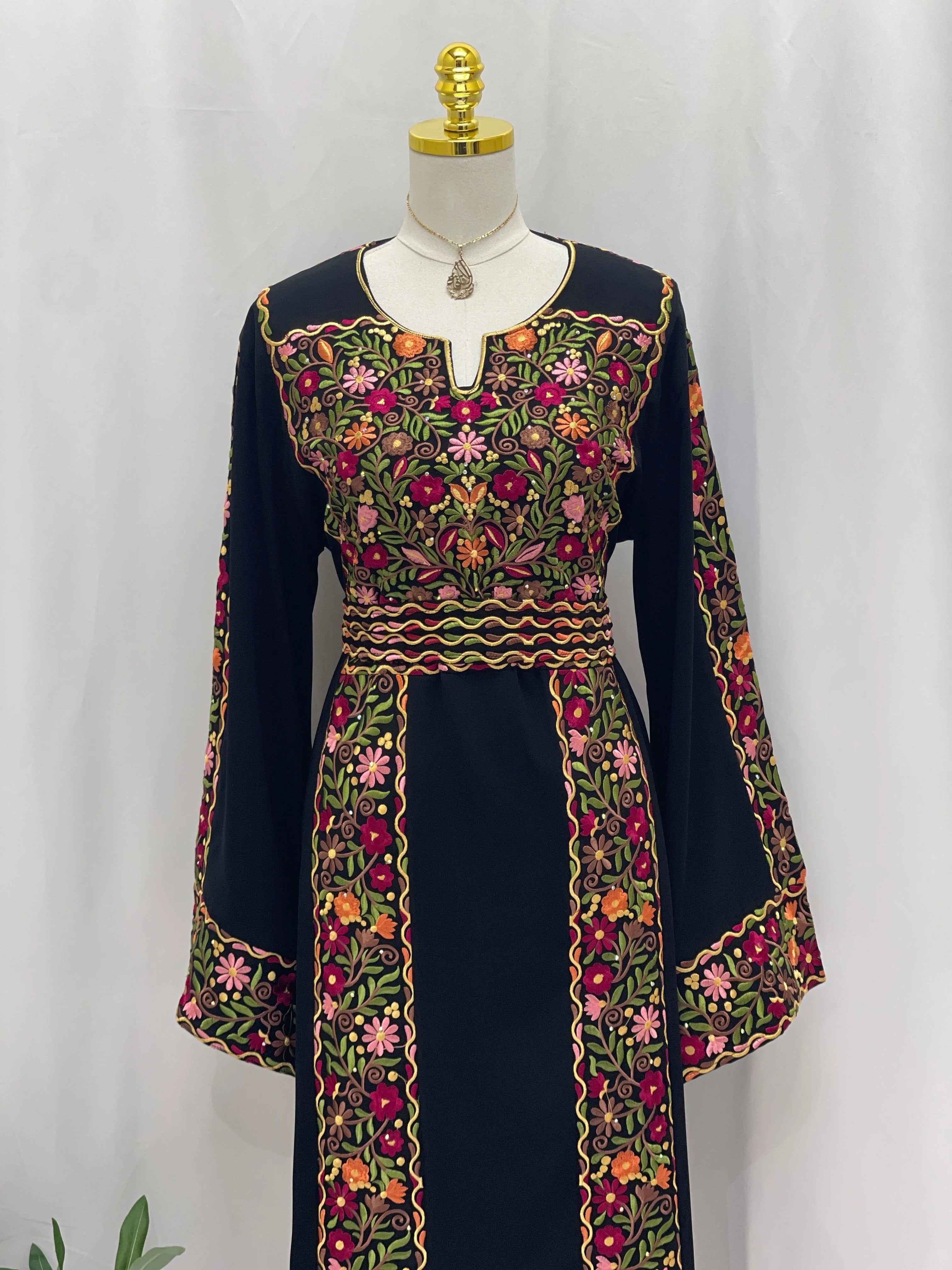 Floral Essence Embroidered Thobe with colorful floral patterns and stylish long sleeves