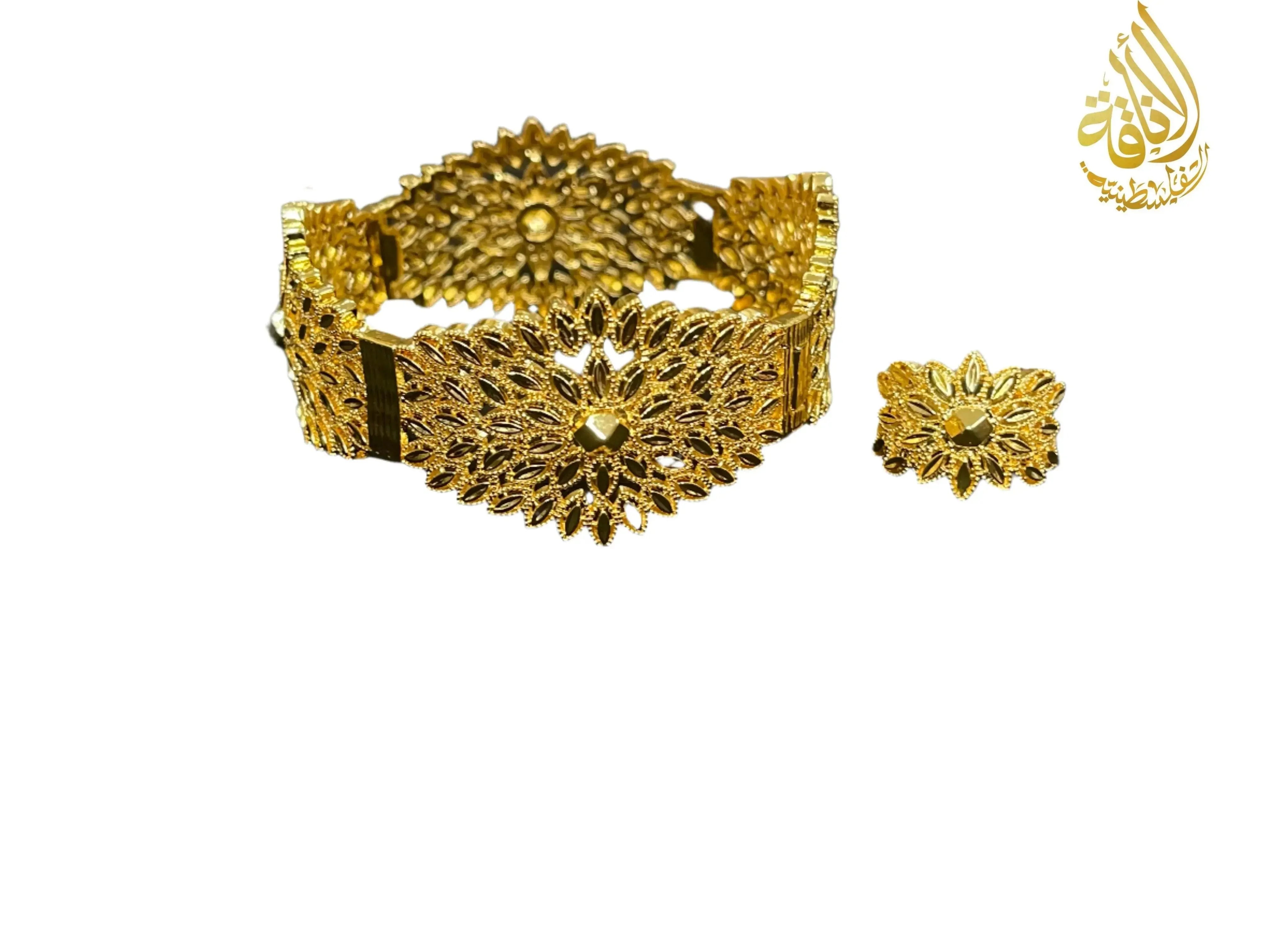 Palestinian gold jewelry set featuring an intricately designed gold bracelet and matching ring