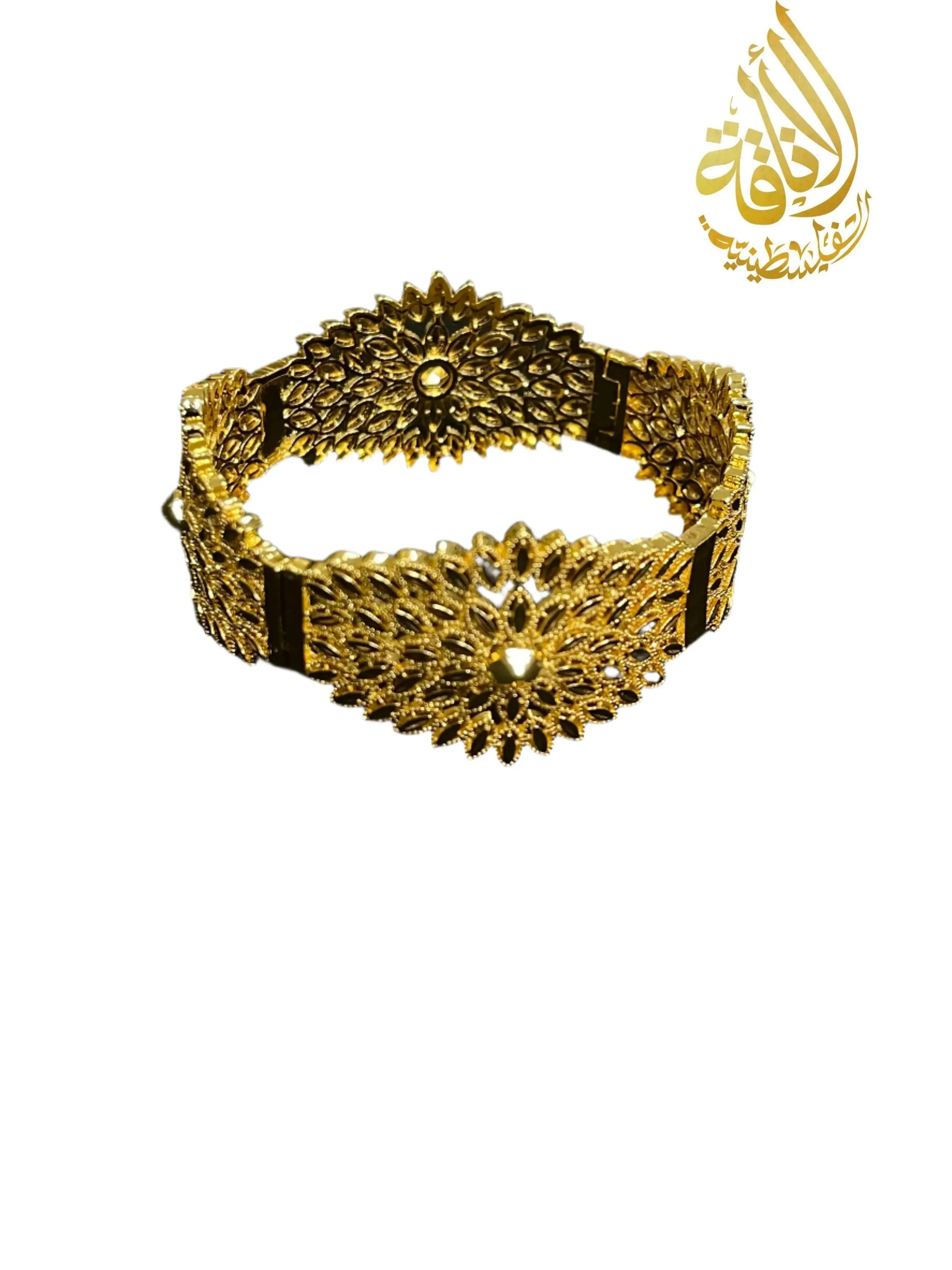 Palestinian gold jewelry set featuring an intricately designed gold bracelet with floral patterns