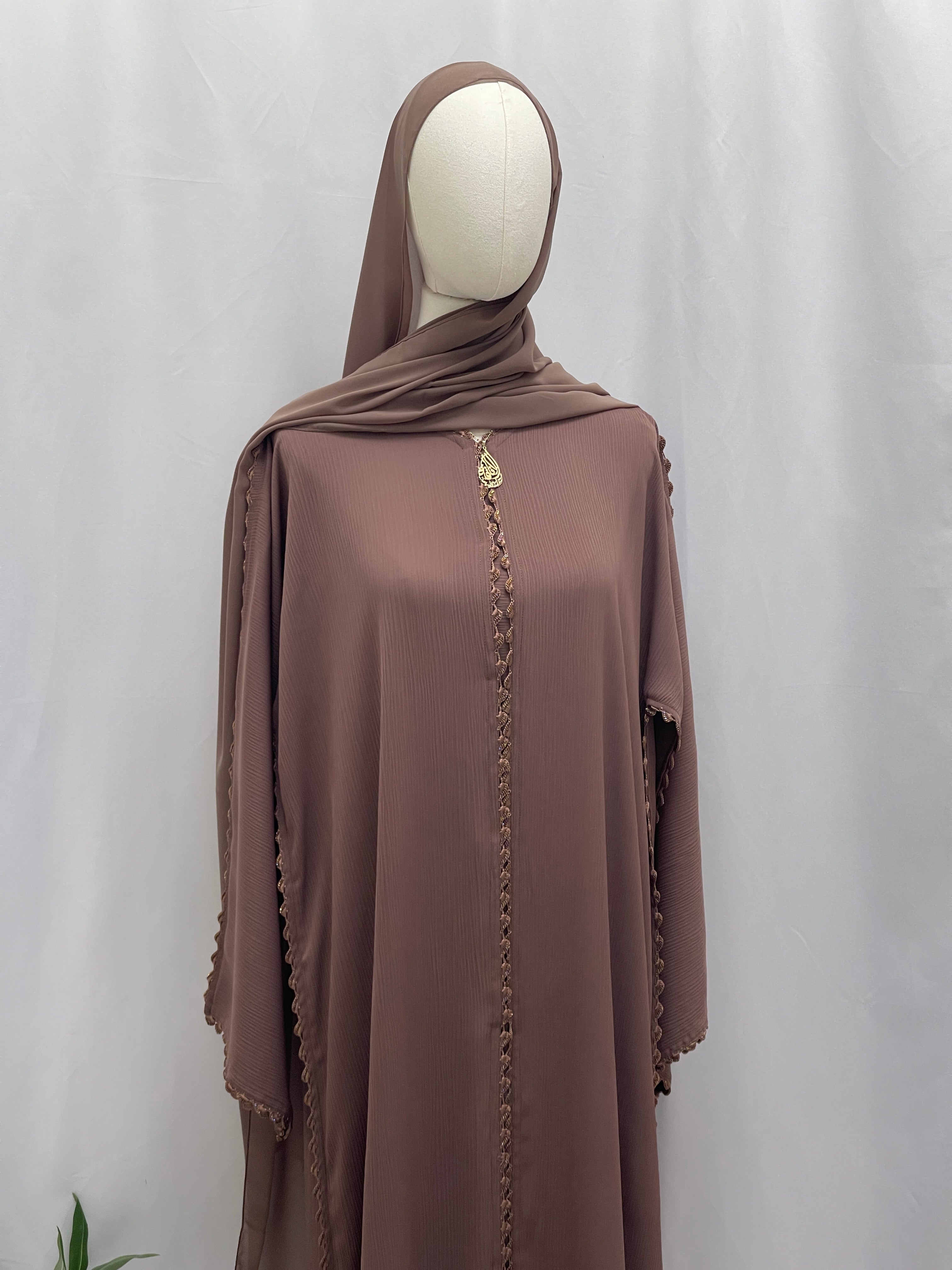 Palestinian Elegance Ghosoon Abaya in soft brown with delicate embroidered trim and matching headscarf